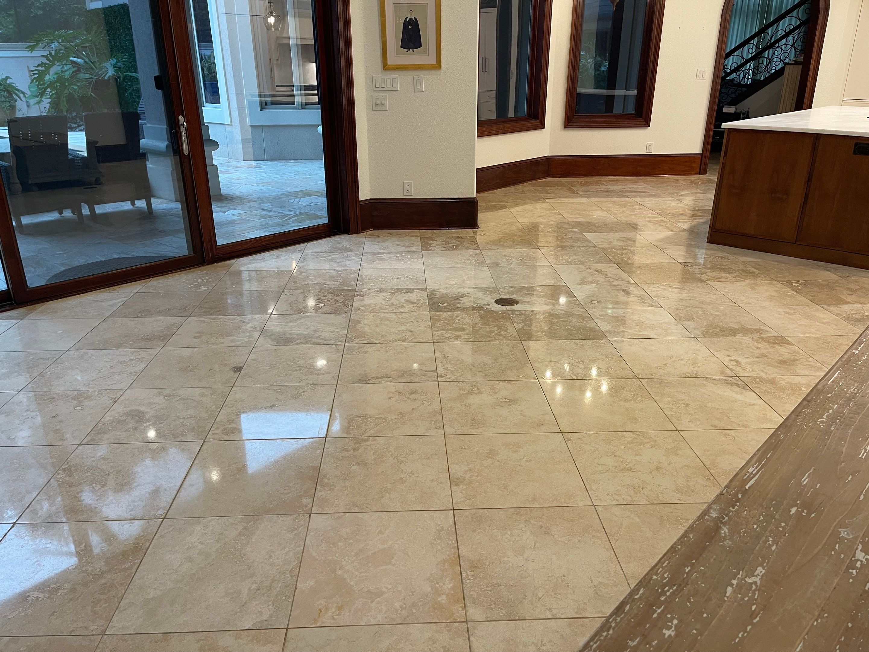 Polished Travertine Floor Restoration for Gulf Shores Residence by Cornerstone Hard Surface Restoration