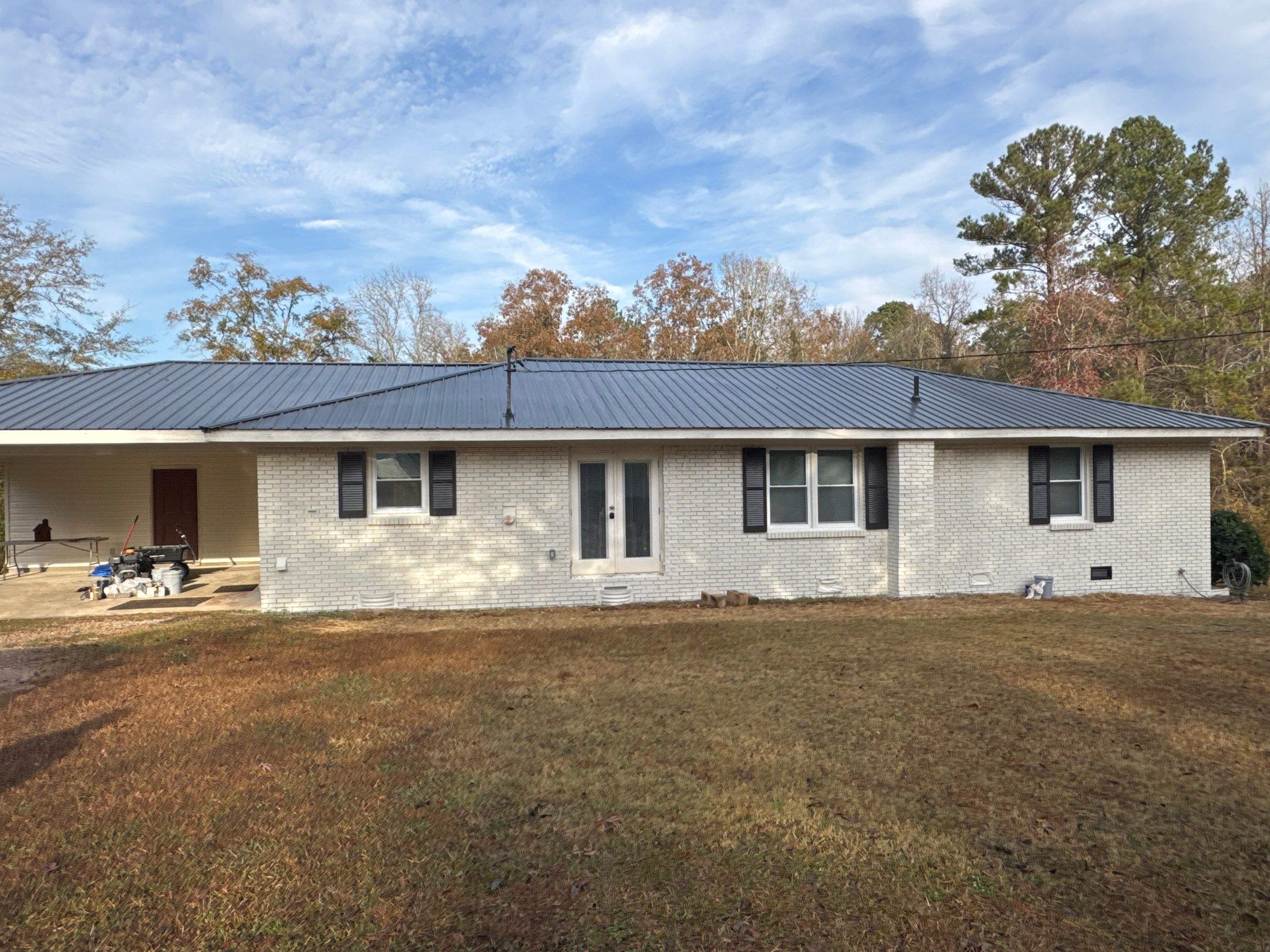 White Masonry Painting and Exterior Home Refresh in Covington by PGP Surface Solutions, LLC