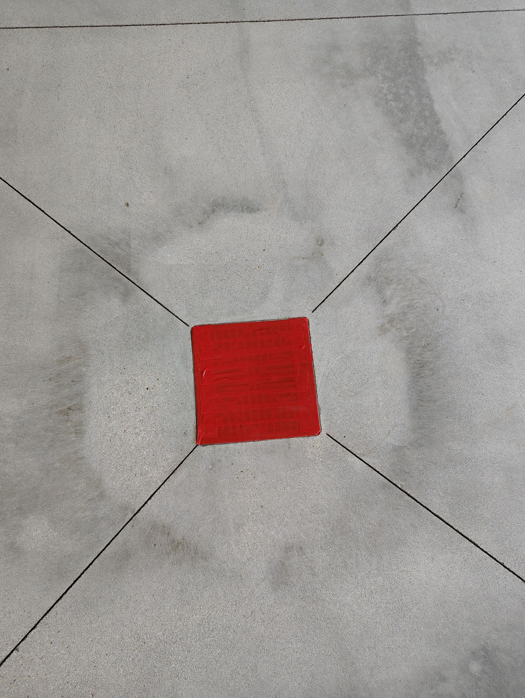 Speckled Polyaspartic Garage Floor Coating Installation in Dell Rapids by Select Painting, Coatings & Garage Cabinets