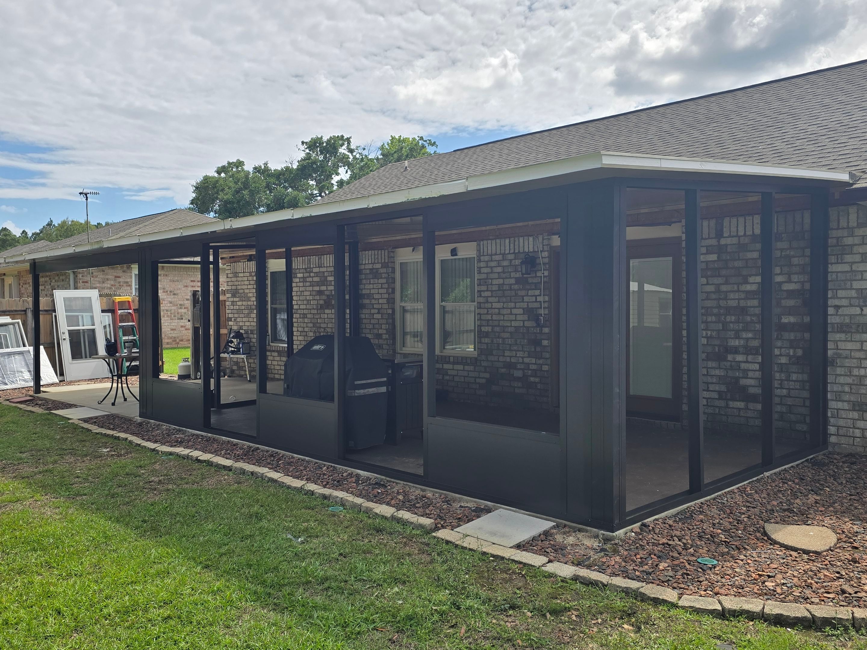 Glass Room & Patio Cover using Colorbeam by Titan Sunrooms