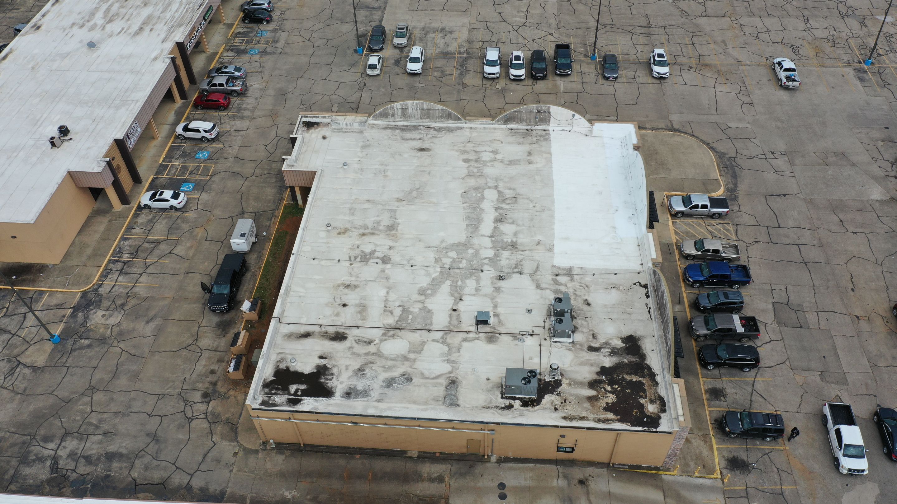 Commercial Roofing Installation using Aldocoat Coatings by Hostetler Roofing