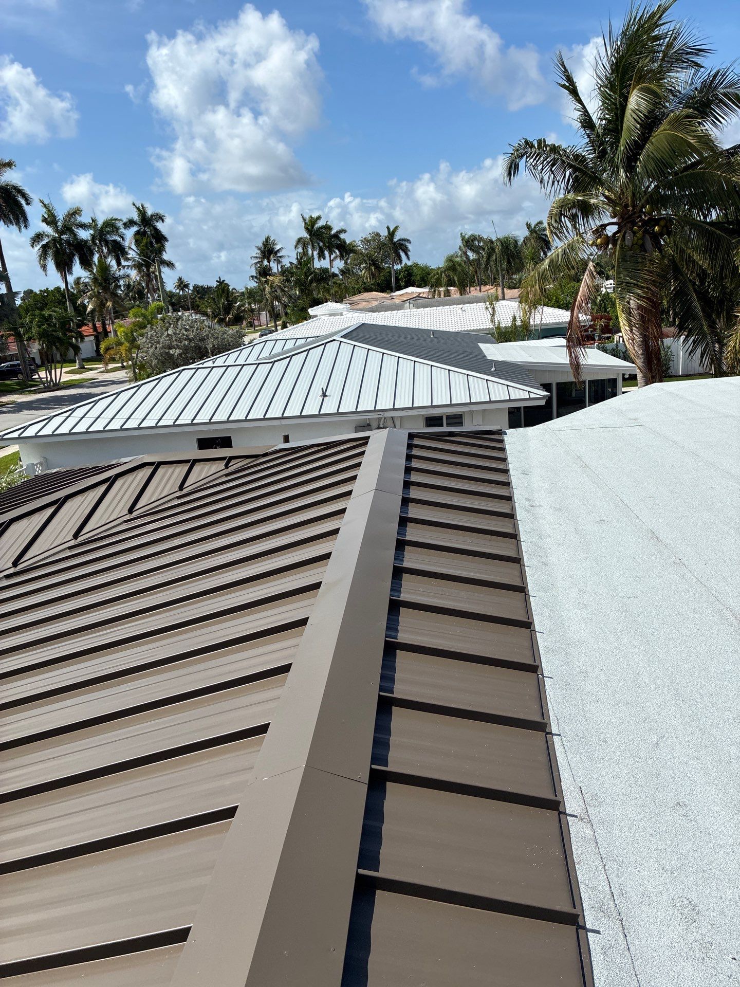 .032 Aluminum 1.5" Mechanical Seam Medium Bronze by Total Roofing System The Metal Roof Experts