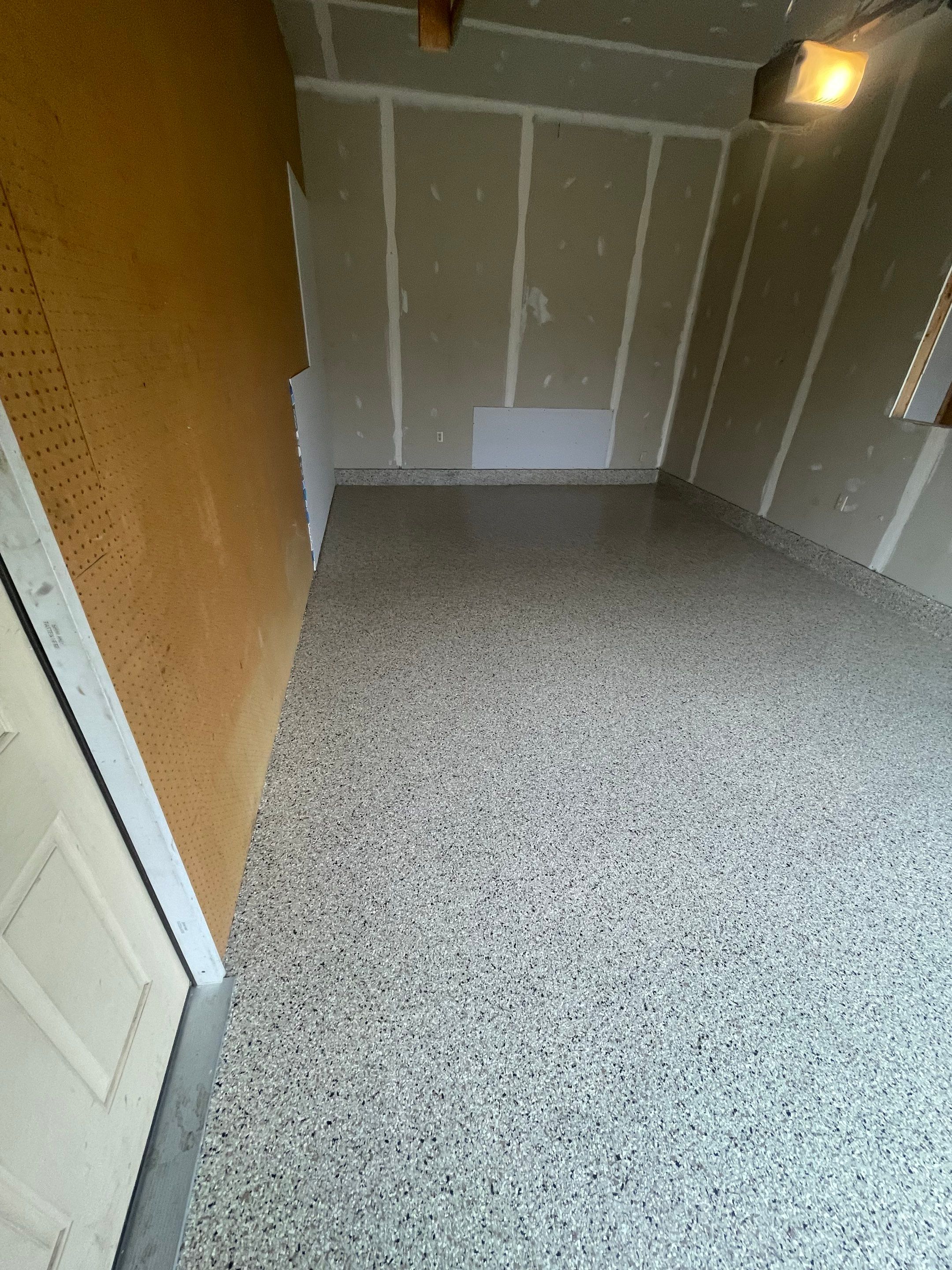 Speckled Epoxy Floor Coating Installation for Centerville Residential Garage by Select Painting, Coatings & Garage Cabinets