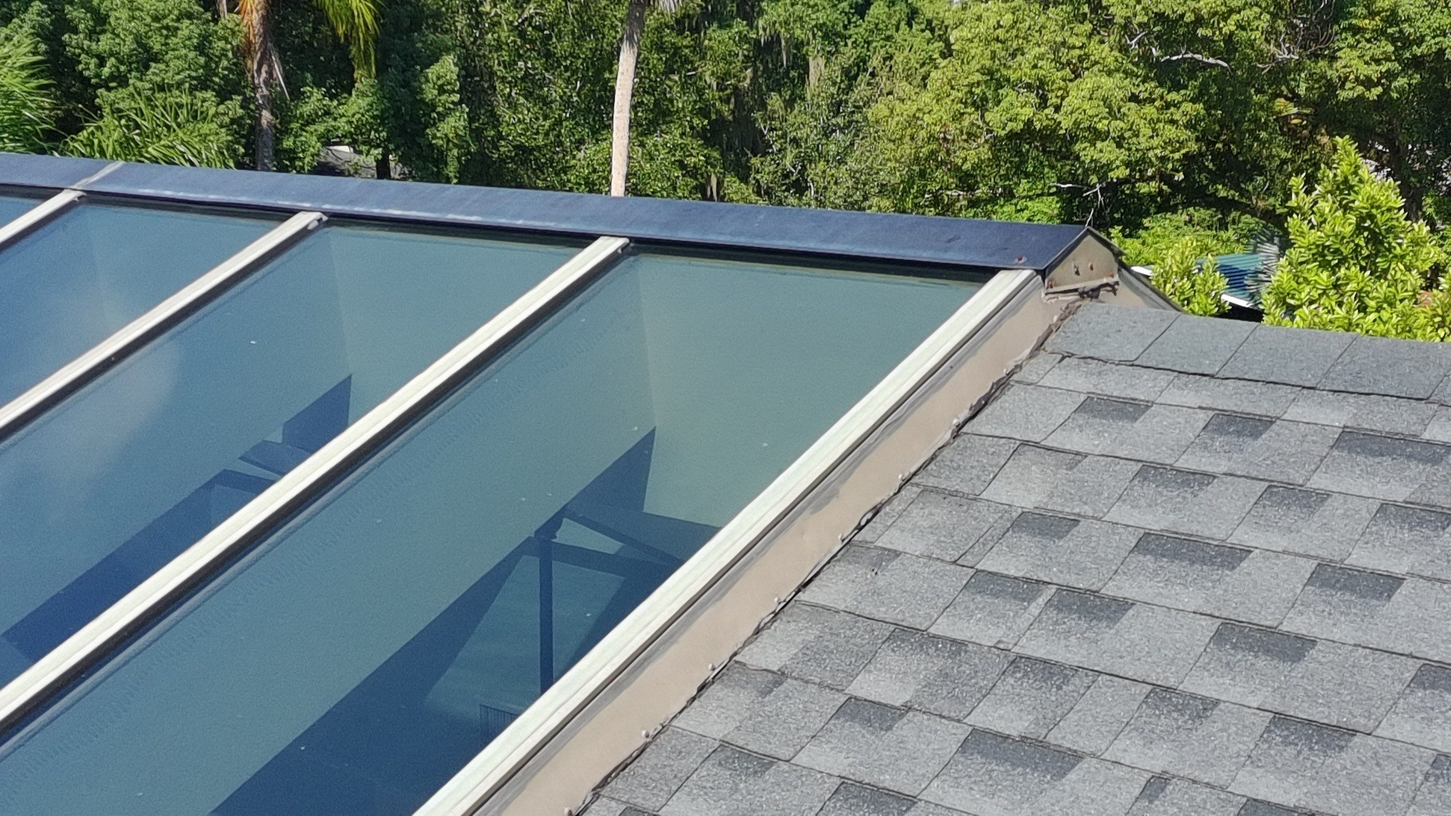 Ridge Skylight Repair and Shingle Roof Maintenance in Winter Park by Fortified Roofing Solutions Corp.