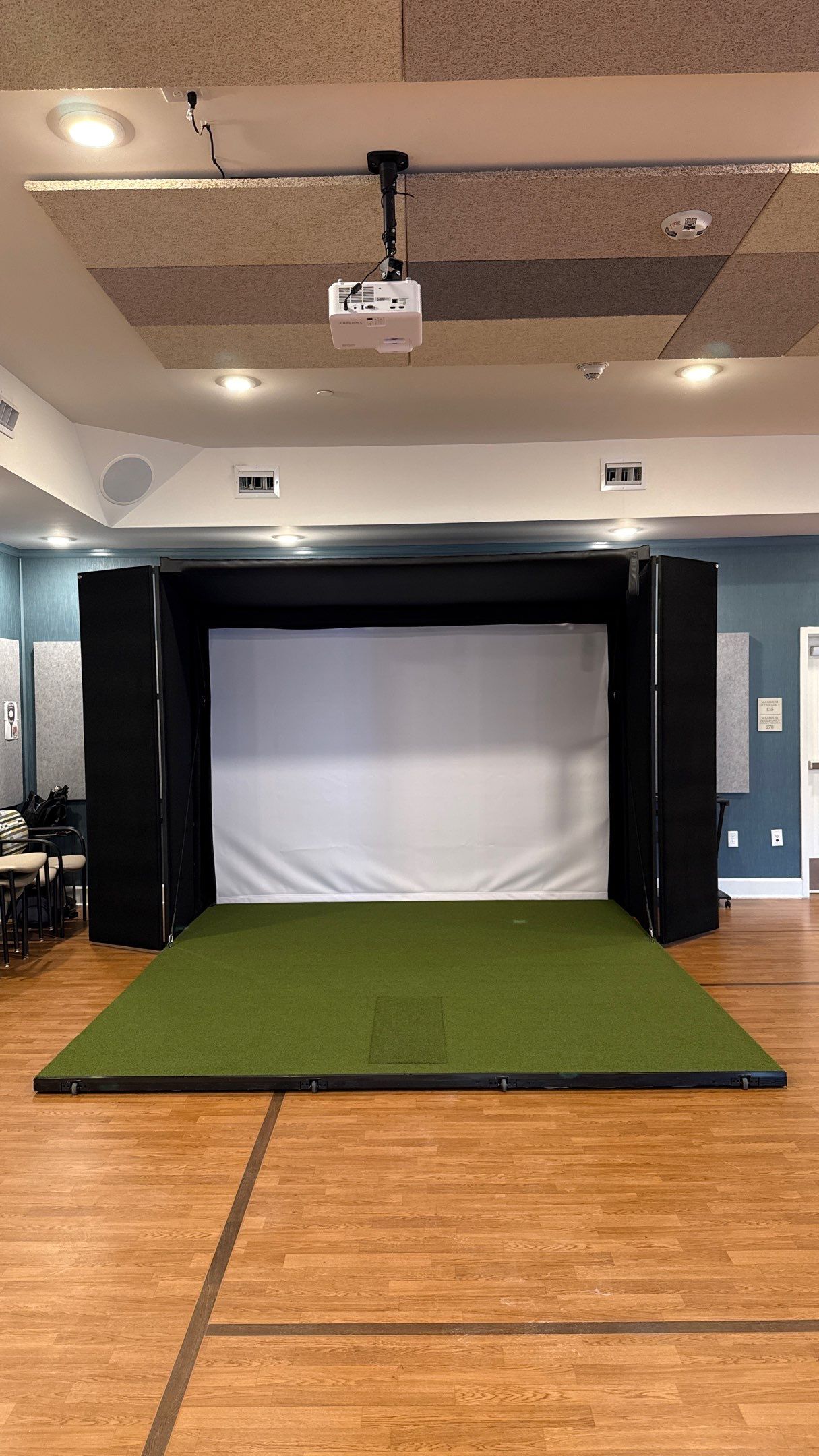 A Beautiful Murphy Golf Simulator  by Banner Garage