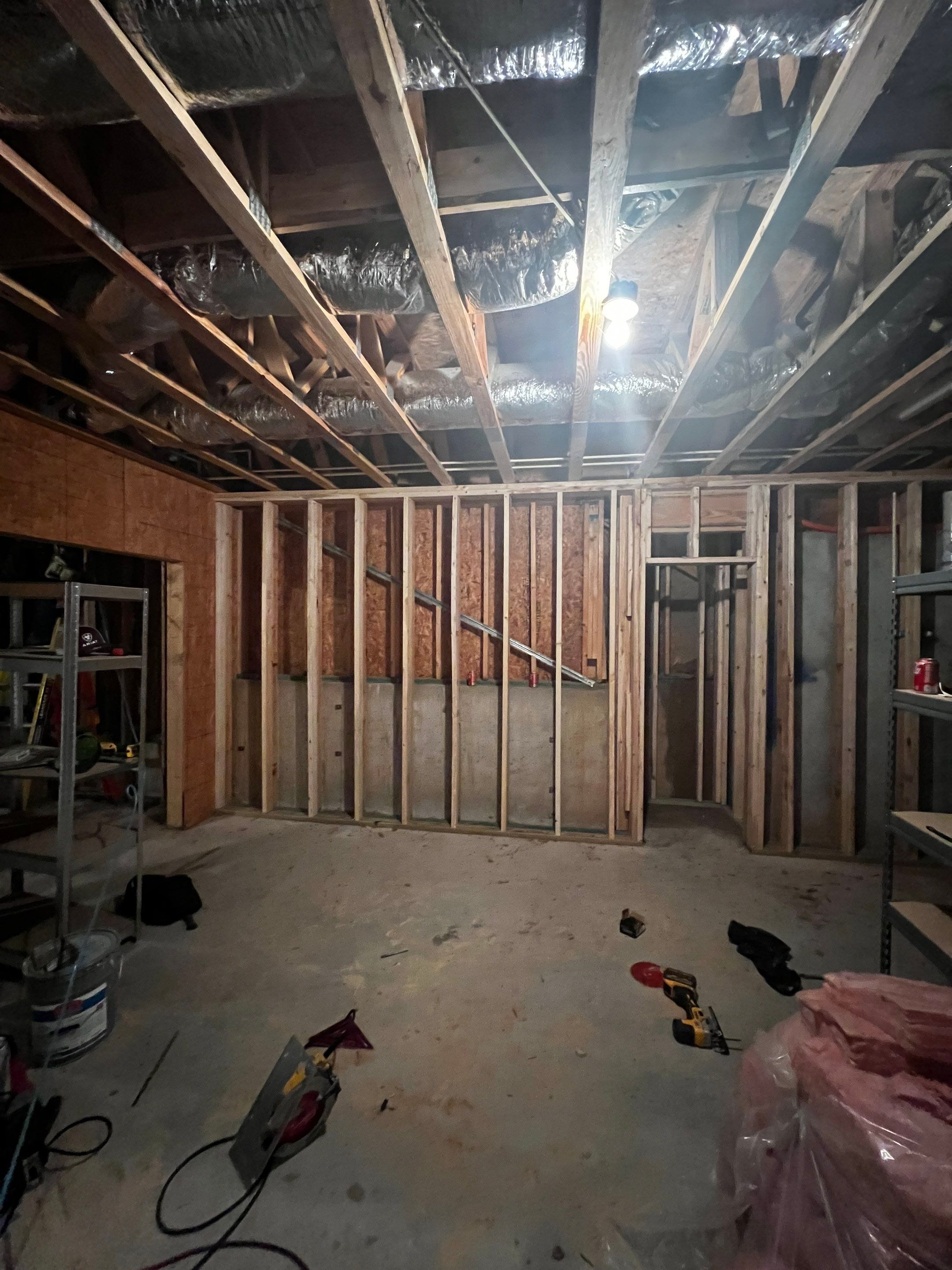 Basement Remodeling With New Bathroom and Luxury Vinyl Flooring by Swift Home Renovations