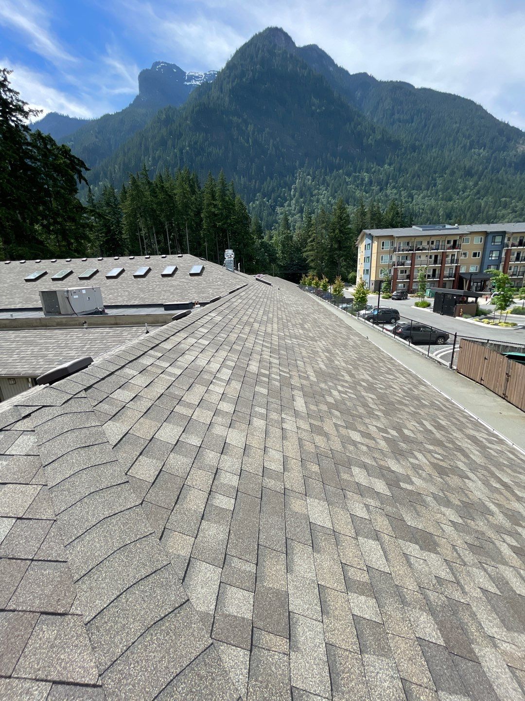Residential ReRoofing Installation using OC Oakridge shingles by Top Notch Roofing Inc