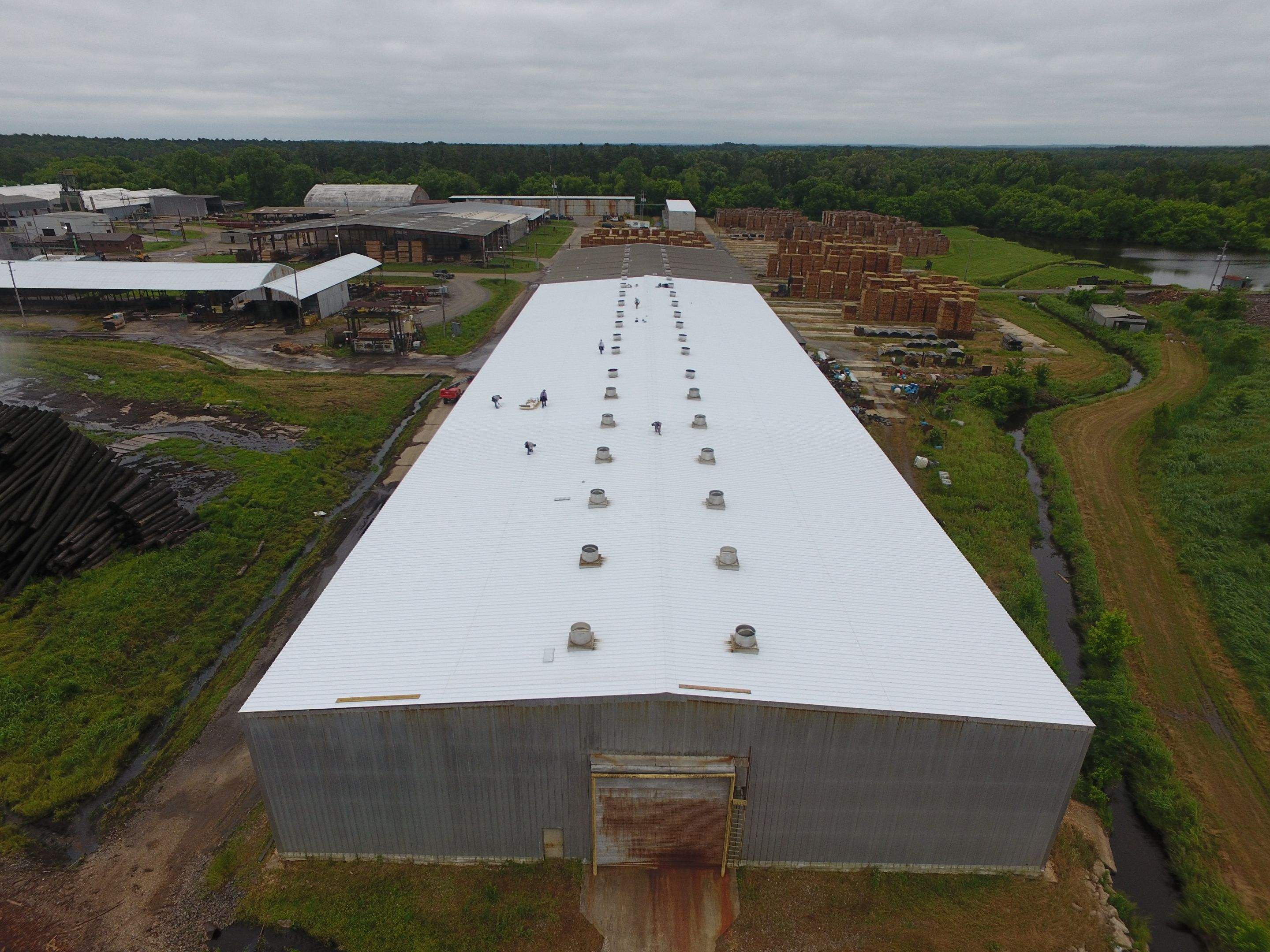 Commercial Roofing Installation using Aluminum Roofing panels by Hostetler Roofing