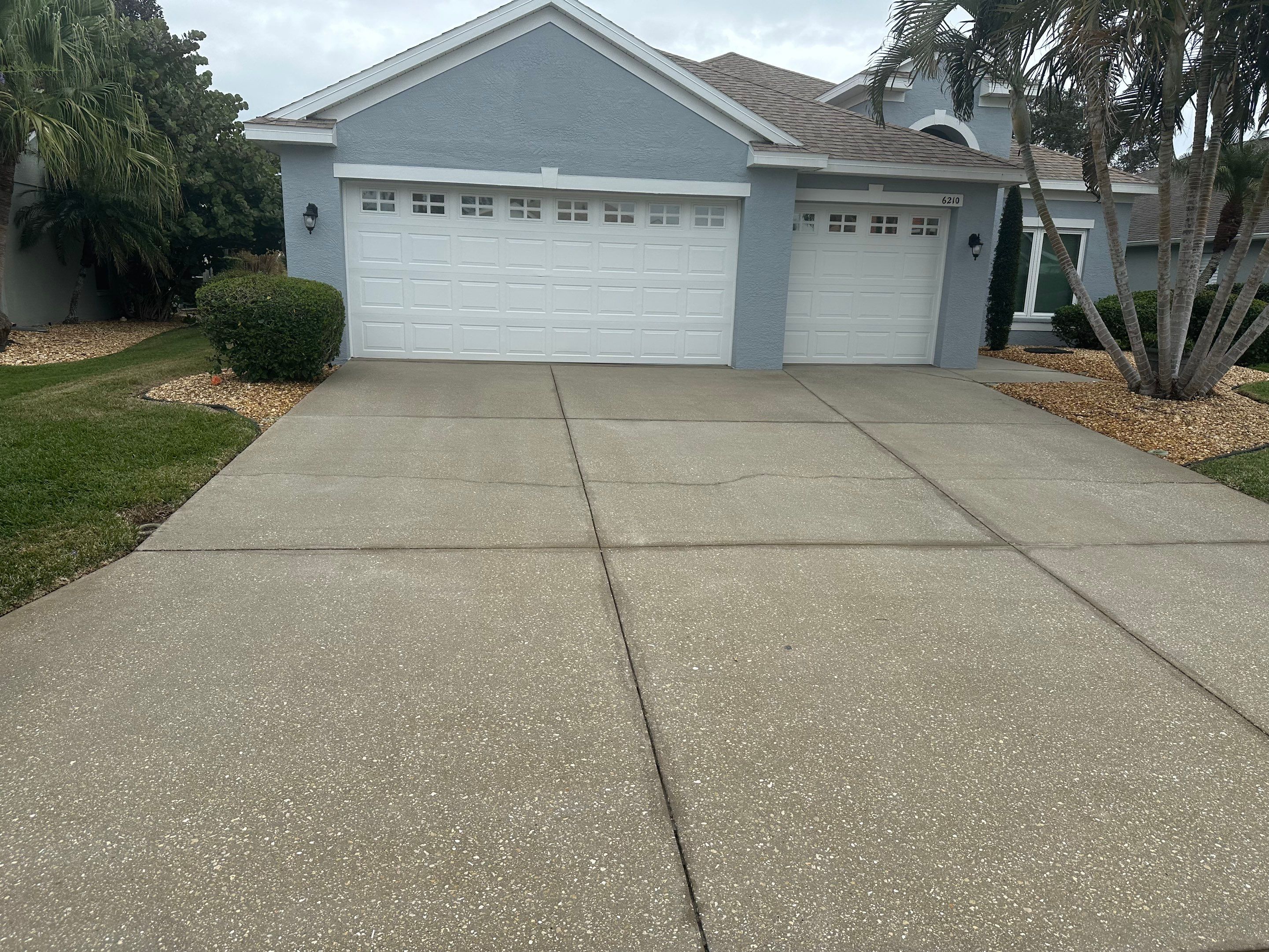 Concrete Driveway, Entryway & Street Curbing Cleaning in Fairways at Imperial Lakes, Palmetto, FL | Sunshine AquaWash by Sunshine AquaWash