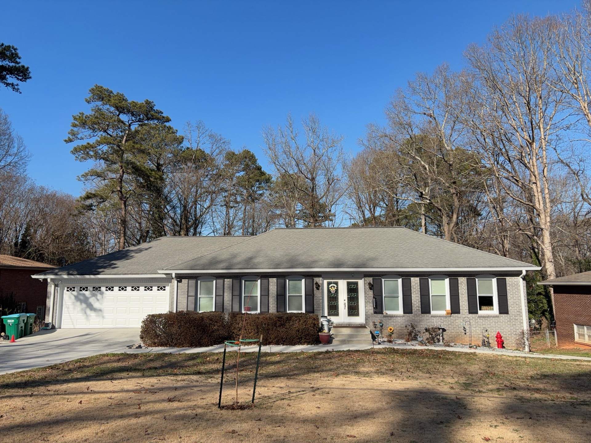 James Hardie Siding Replacement, Trex Railing Install, Exterior Painting, and Staining in Stone Mountain, GA by Nelson Exteriors 