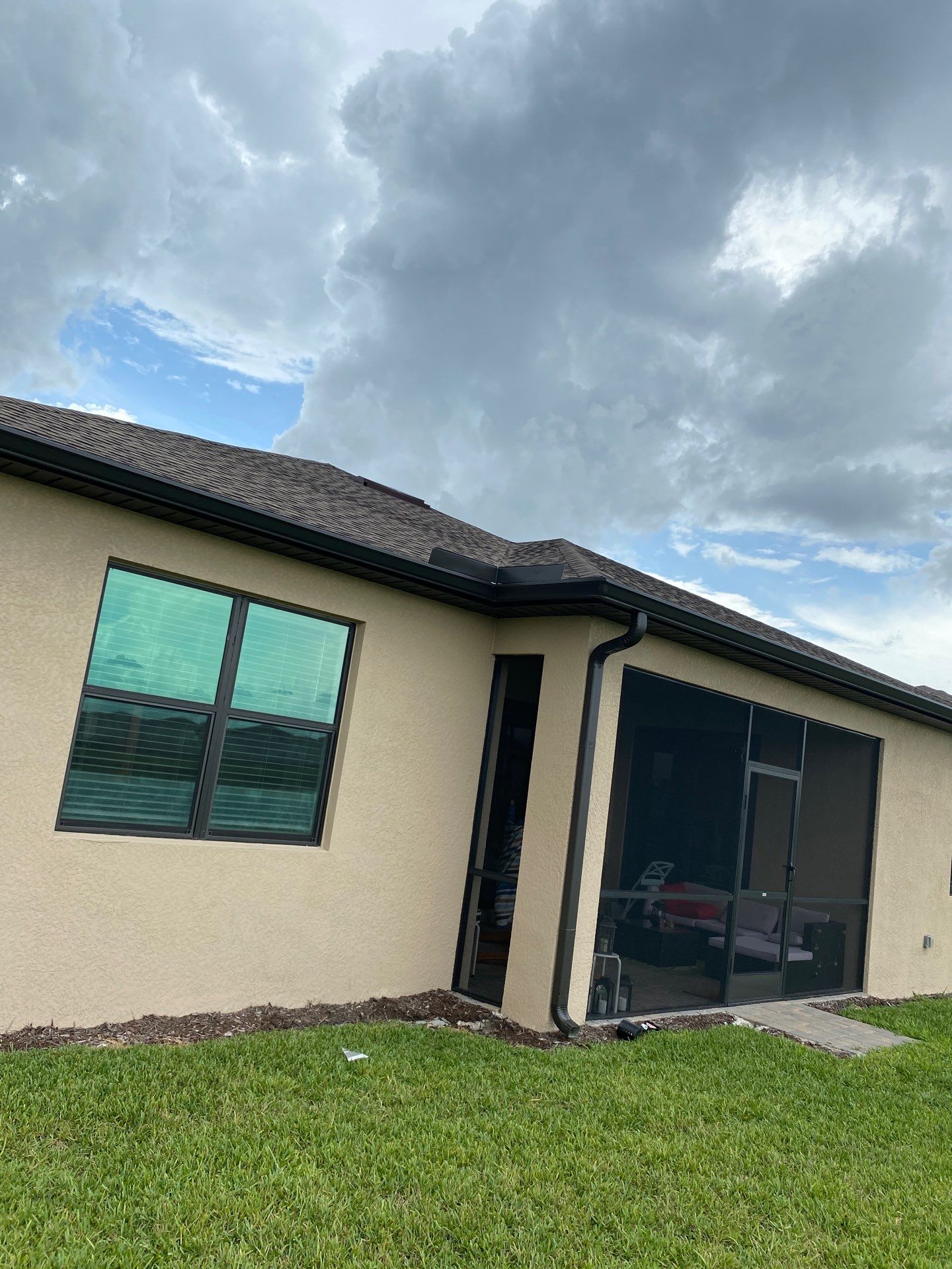 Brown Seamless Gutters for Homes in Fort Myers by Gutter Professors
