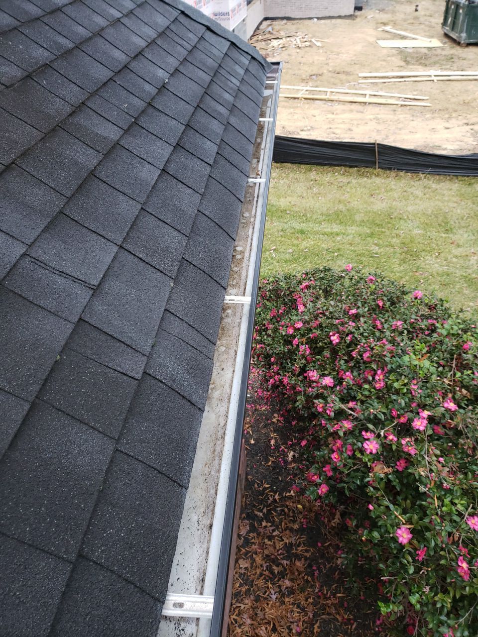 Gutter Cleaning using water by Power Wash Masters LLC