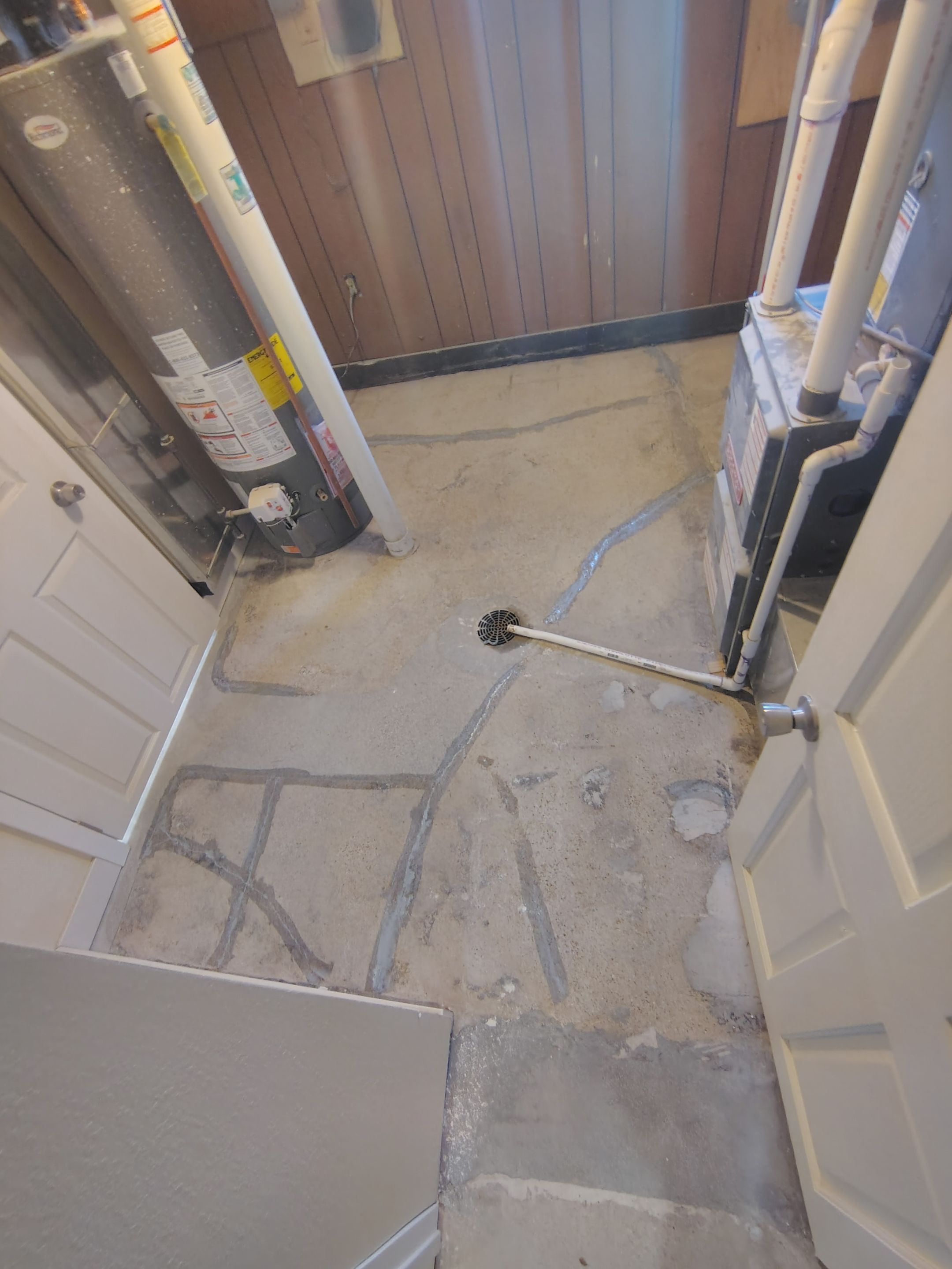 Comprehensive Basement Concrete Floor Coating and Crack Repair in Sioux Falls by Select Painting, Coatings & Garage Cabinets