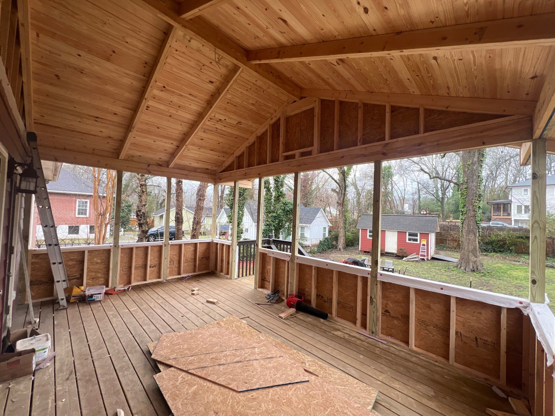 Elevated Screened-In Porch Addition with Vaulted Tongue-and-Groove Ceiling by Swift Home Renovations