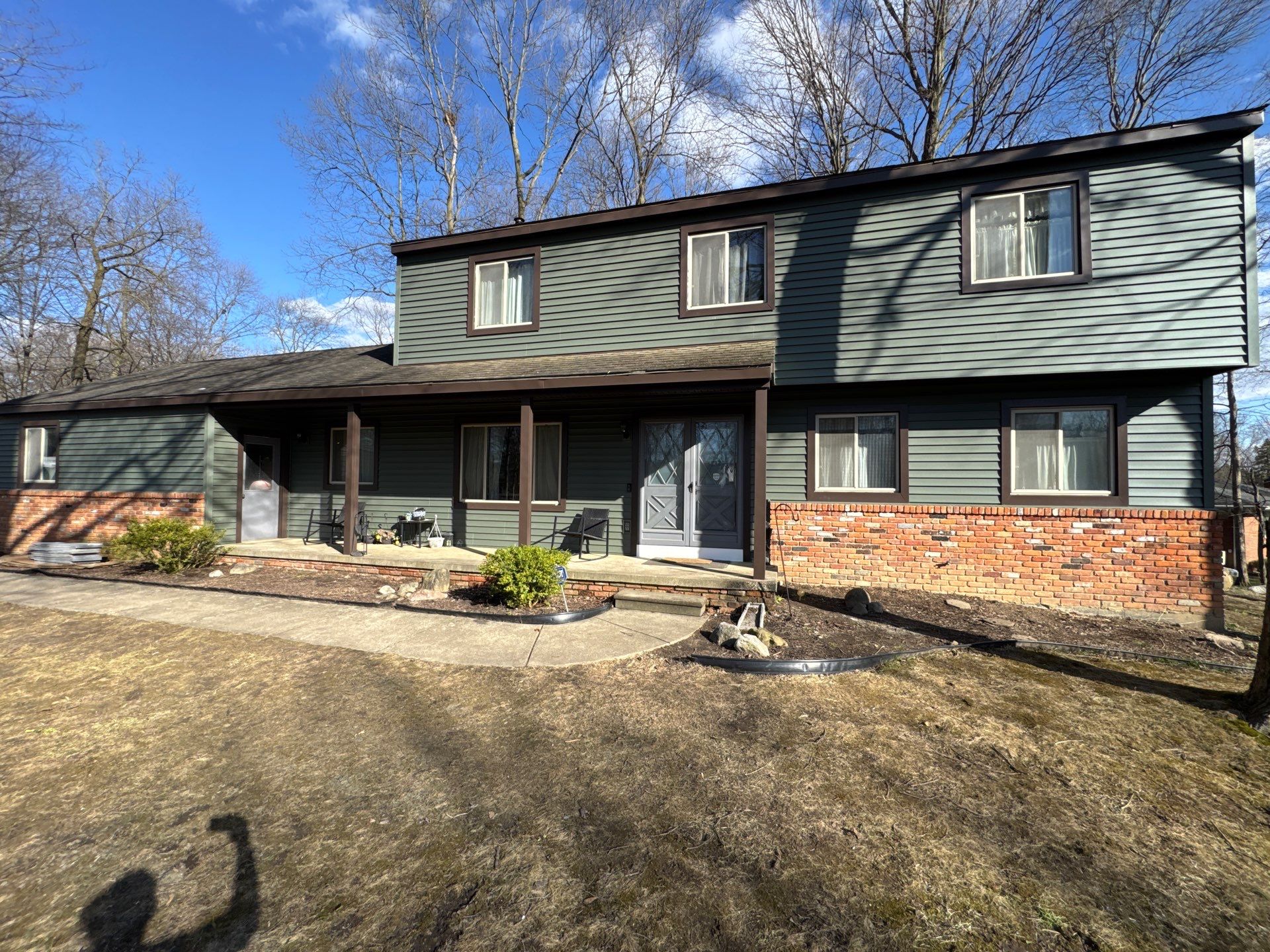 Siding Replacement using Alside Charter Oak D4.5" Deep Moss by 180 Contractors