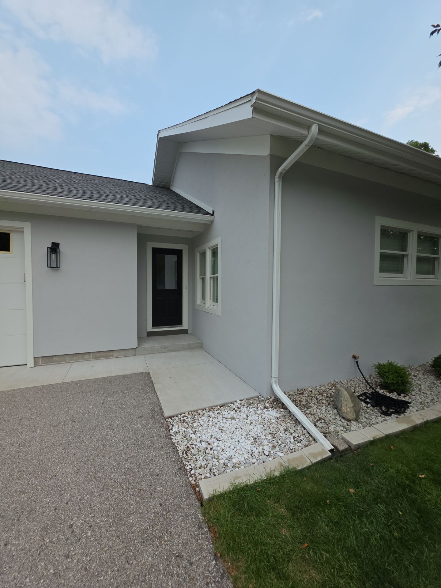 Norton Shores Residential Stucco Repair and Exterior Painting Refresh by Gordon Painting