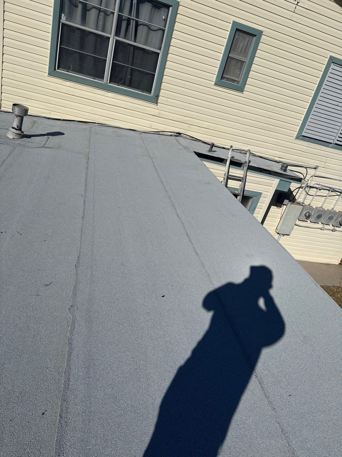 Mustang Island Flat Top by Bayfront Roofing and Construction
