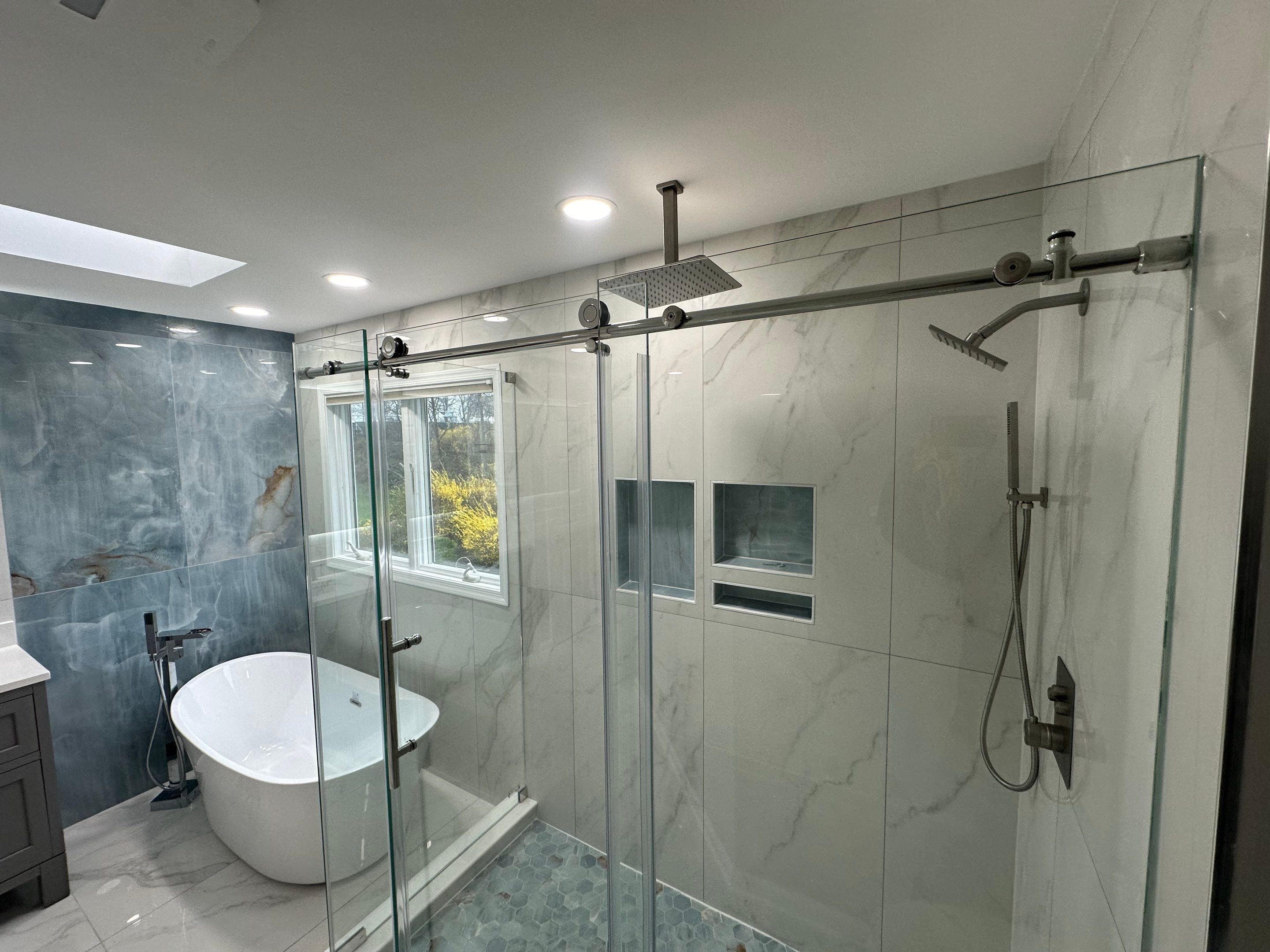 Bathroom Remodel using Tile by Home Concepts Construction