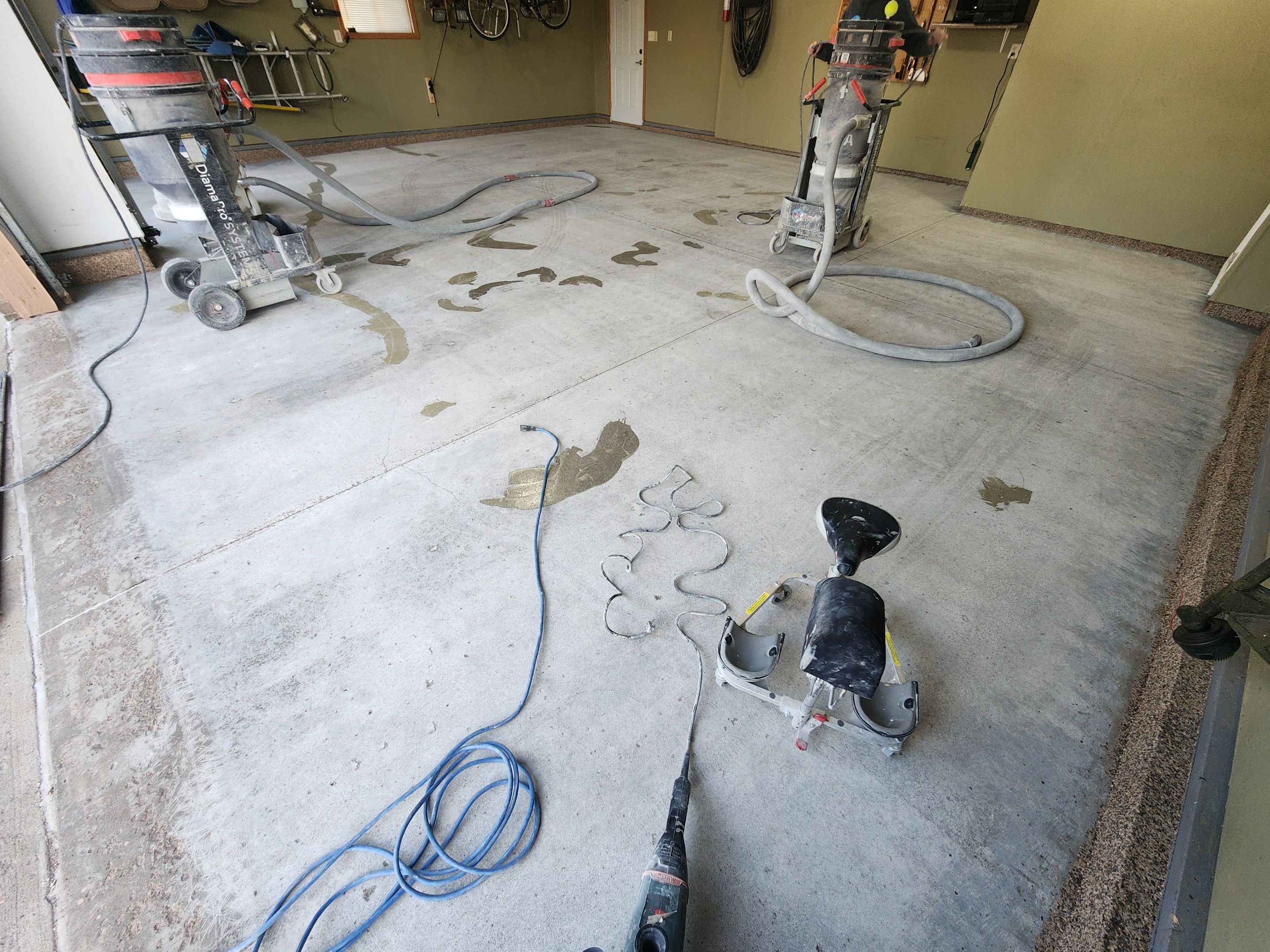Sioux Falls Garage Floor Concrete Coating with Textured Aggregate by Select Painting, Coatings & Garage Cabinets