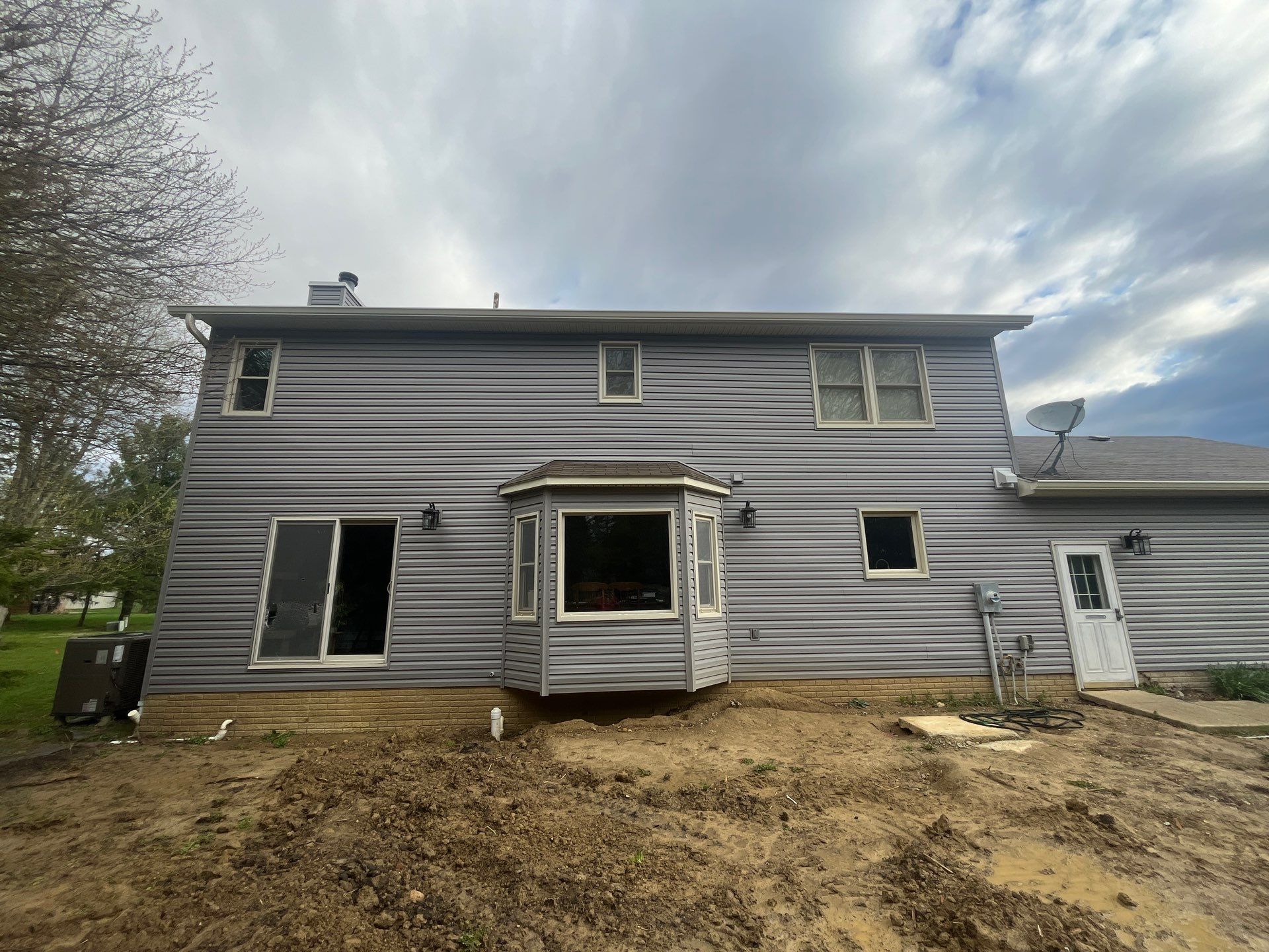 Siding Replacement by Woodring Gutters & Contracting 