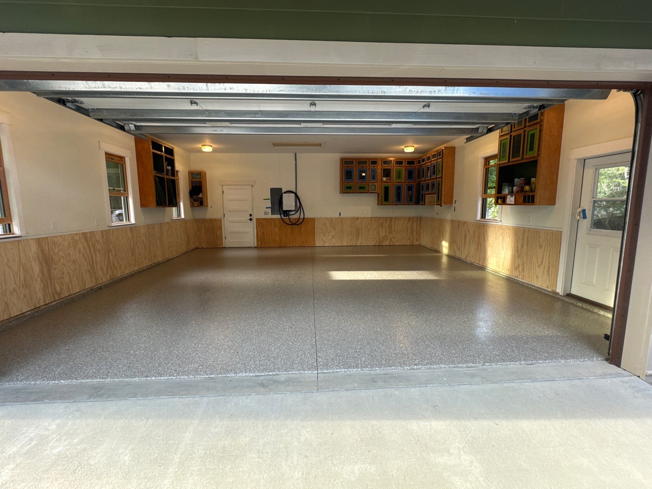 Garage in Pebble Beach by Cross Creek Concrete Coatings