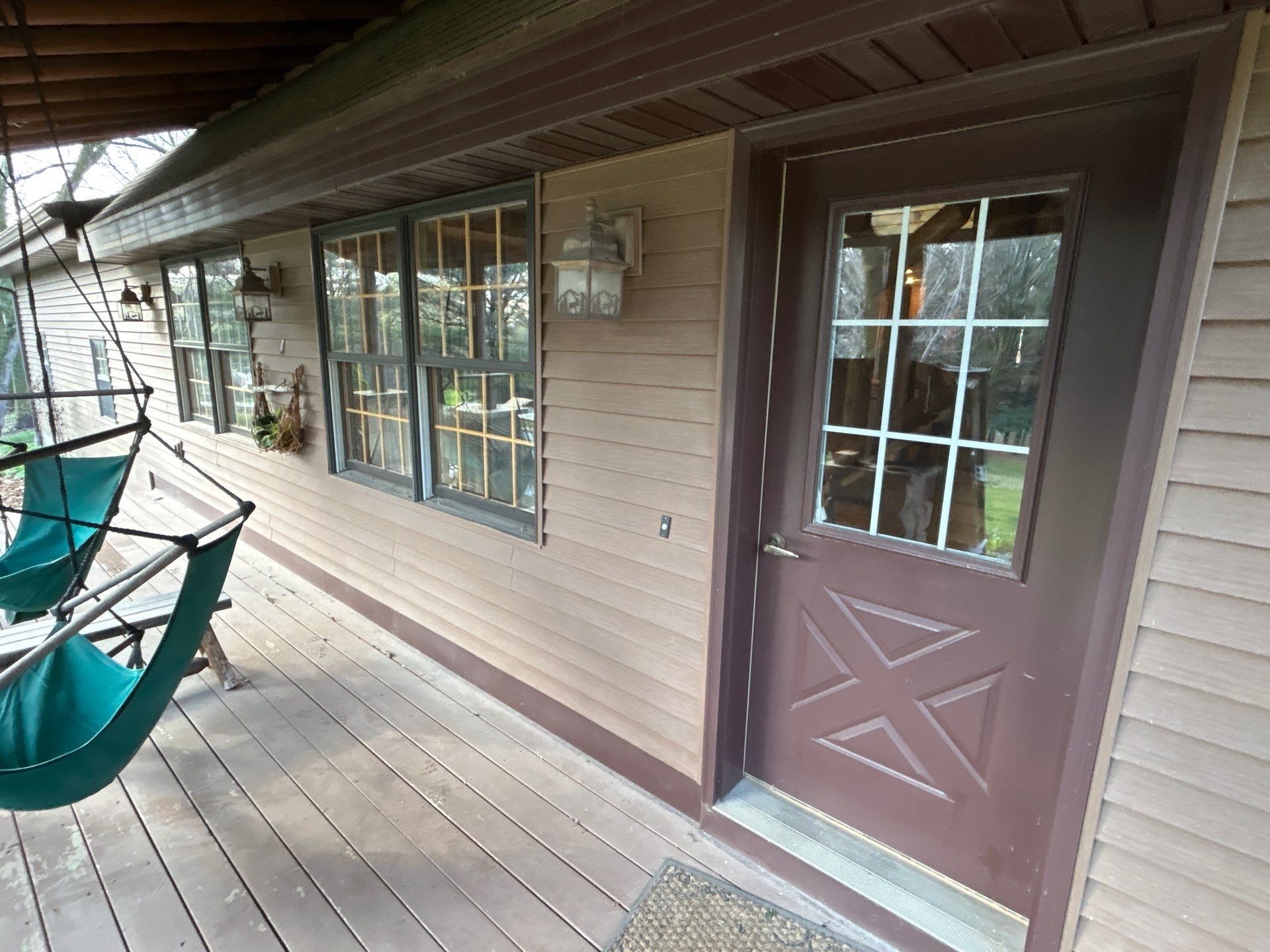 Pella Window installation using Pella Lifestyle wood/Aluminum window by United Windows and Siding LLC