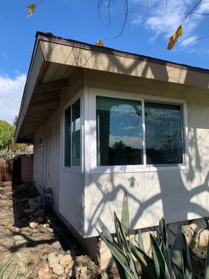 Window Installation using Black Vinyl Windows
