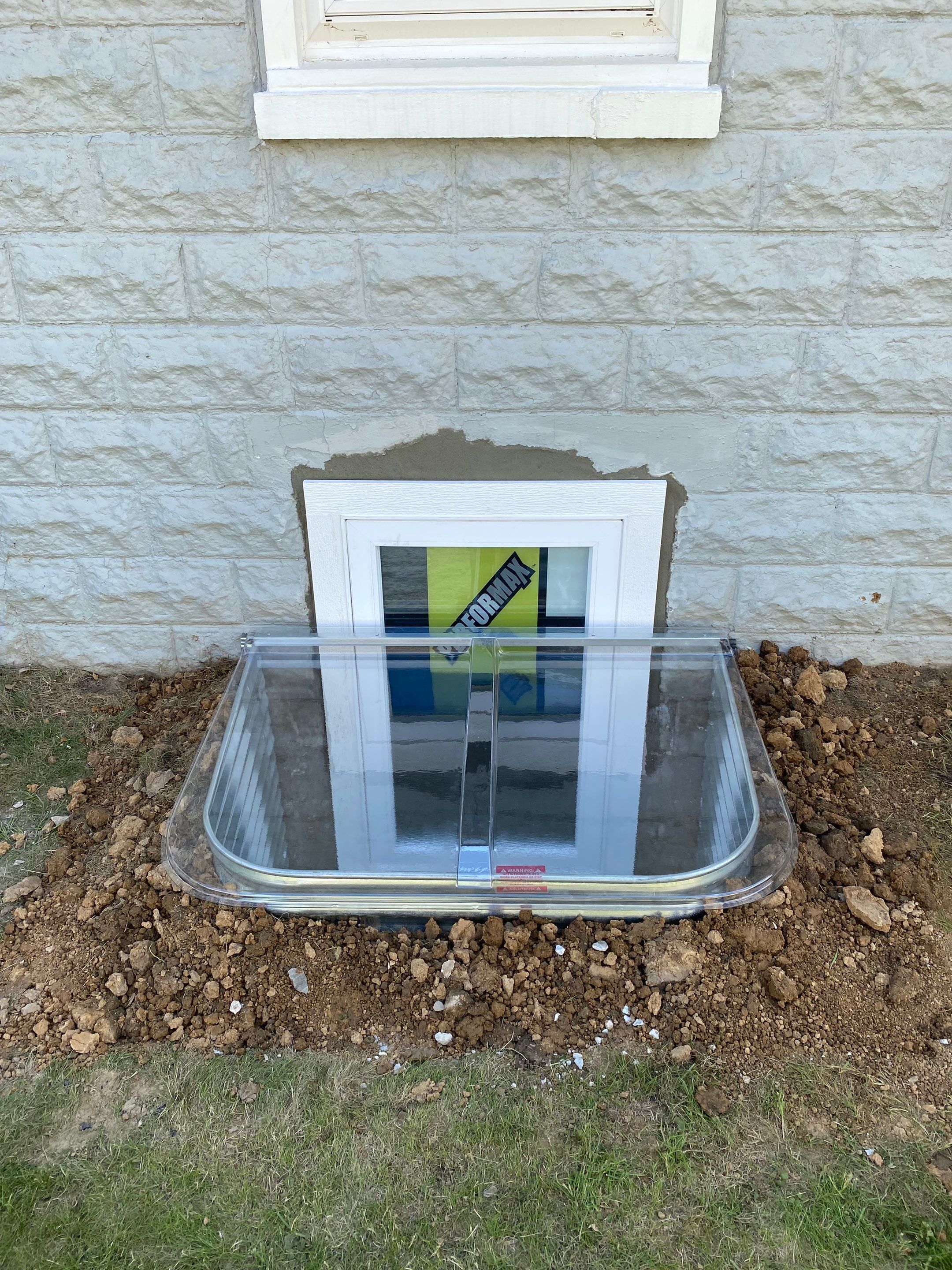 Two Egress Windows by ACE Waterproofing & Basement Solutions