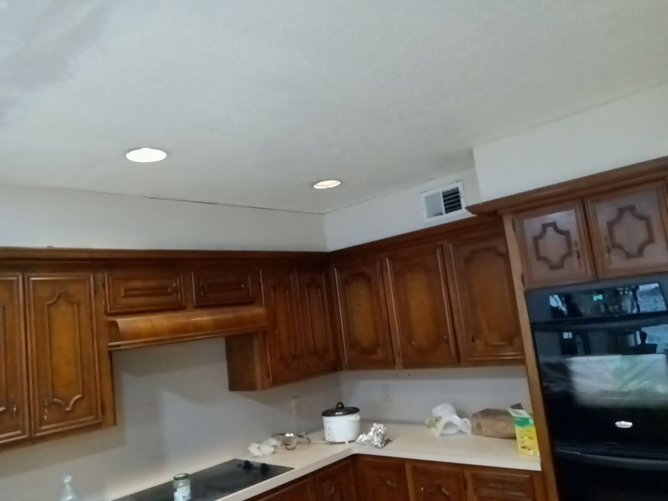 Interior and exterior painting project by Roof Concepts Construction
