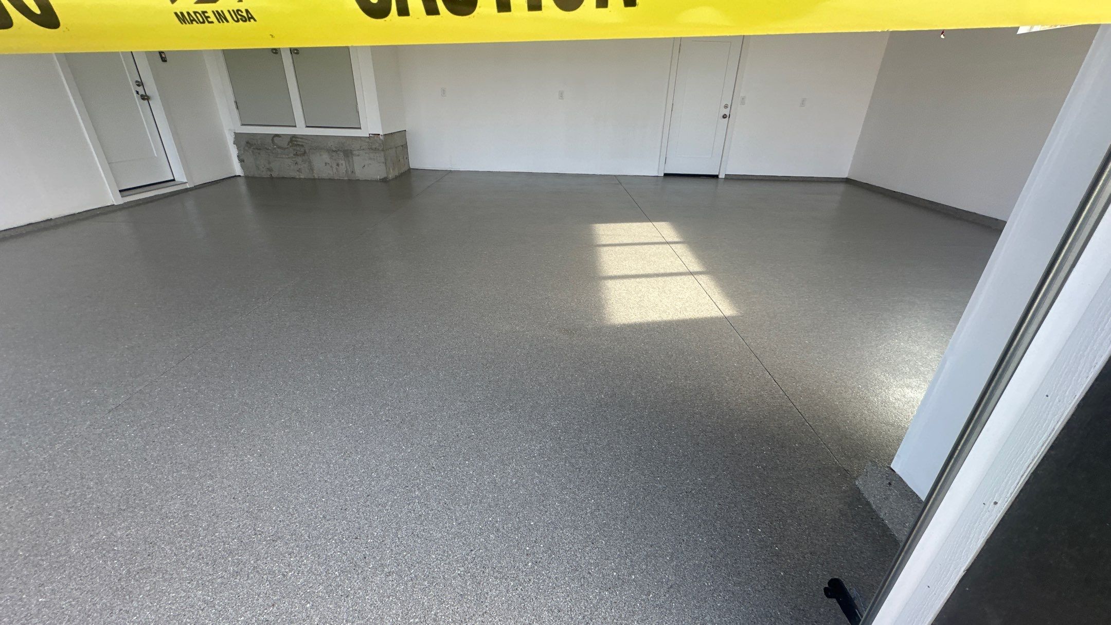 Garage Transformation using Travertine by Croc Coatings, LLC