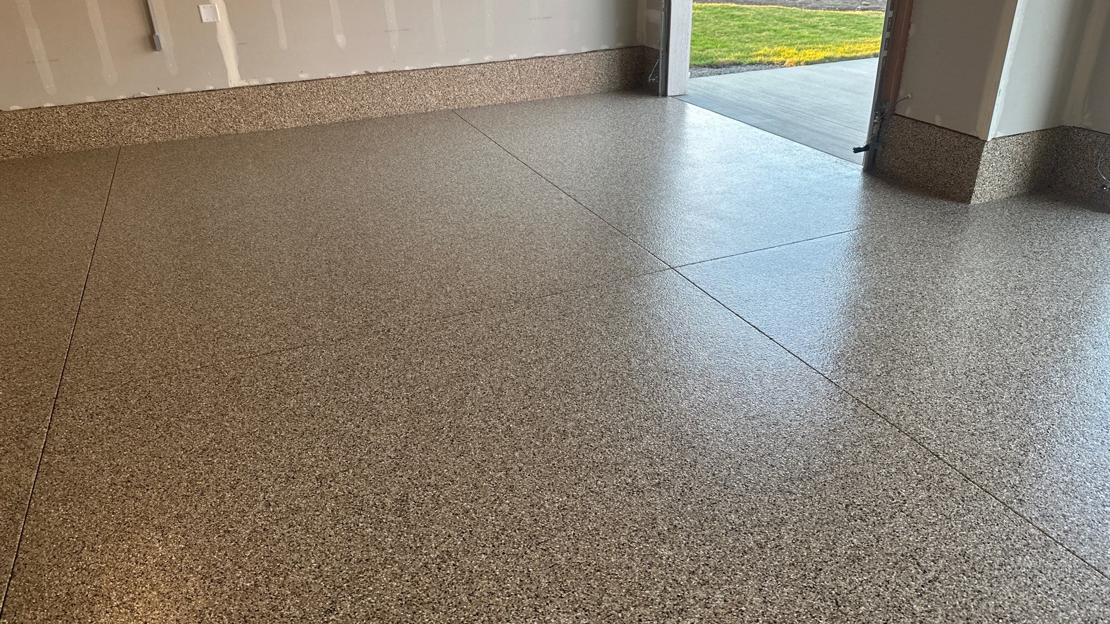 Garage Transformation using Sandstone by Croc Coatings, LLC