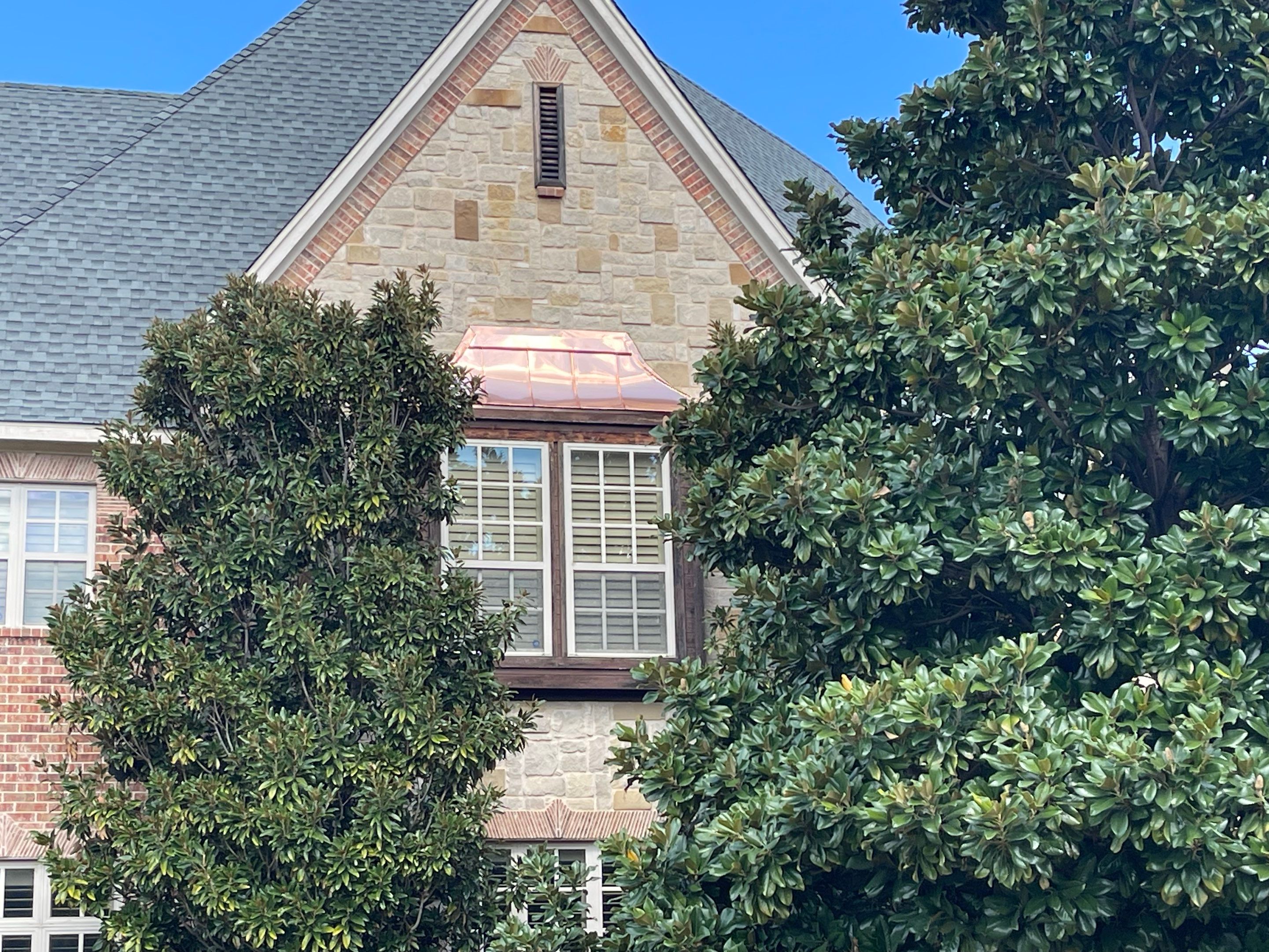 Southlake Texas Estate - Roof, Copper Awning and Gutter Project by First United Roofing & Construction