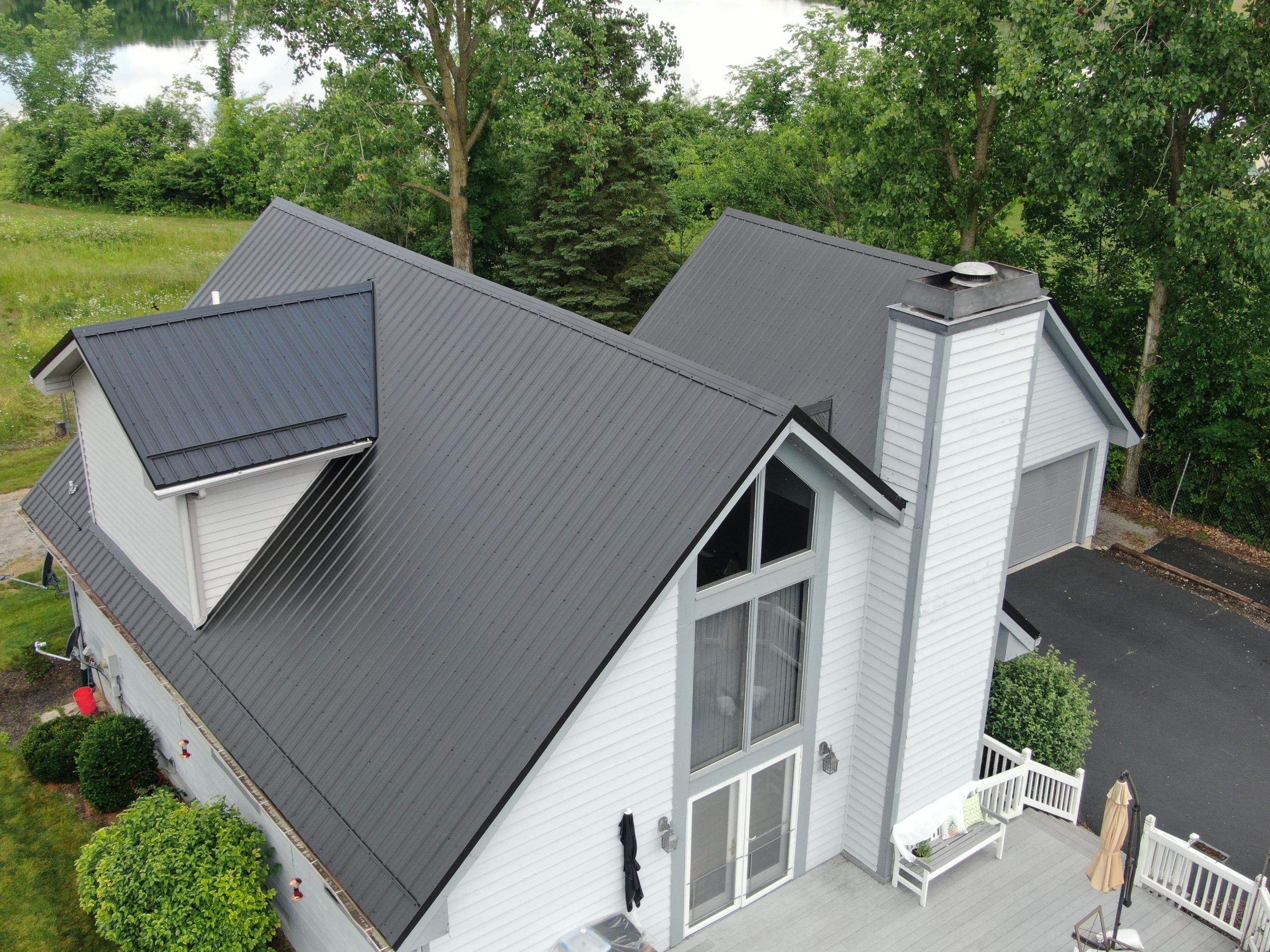 Residential Roofing Installation using Exposed Fastener Metal Roof by 4Ever Metal Roofing