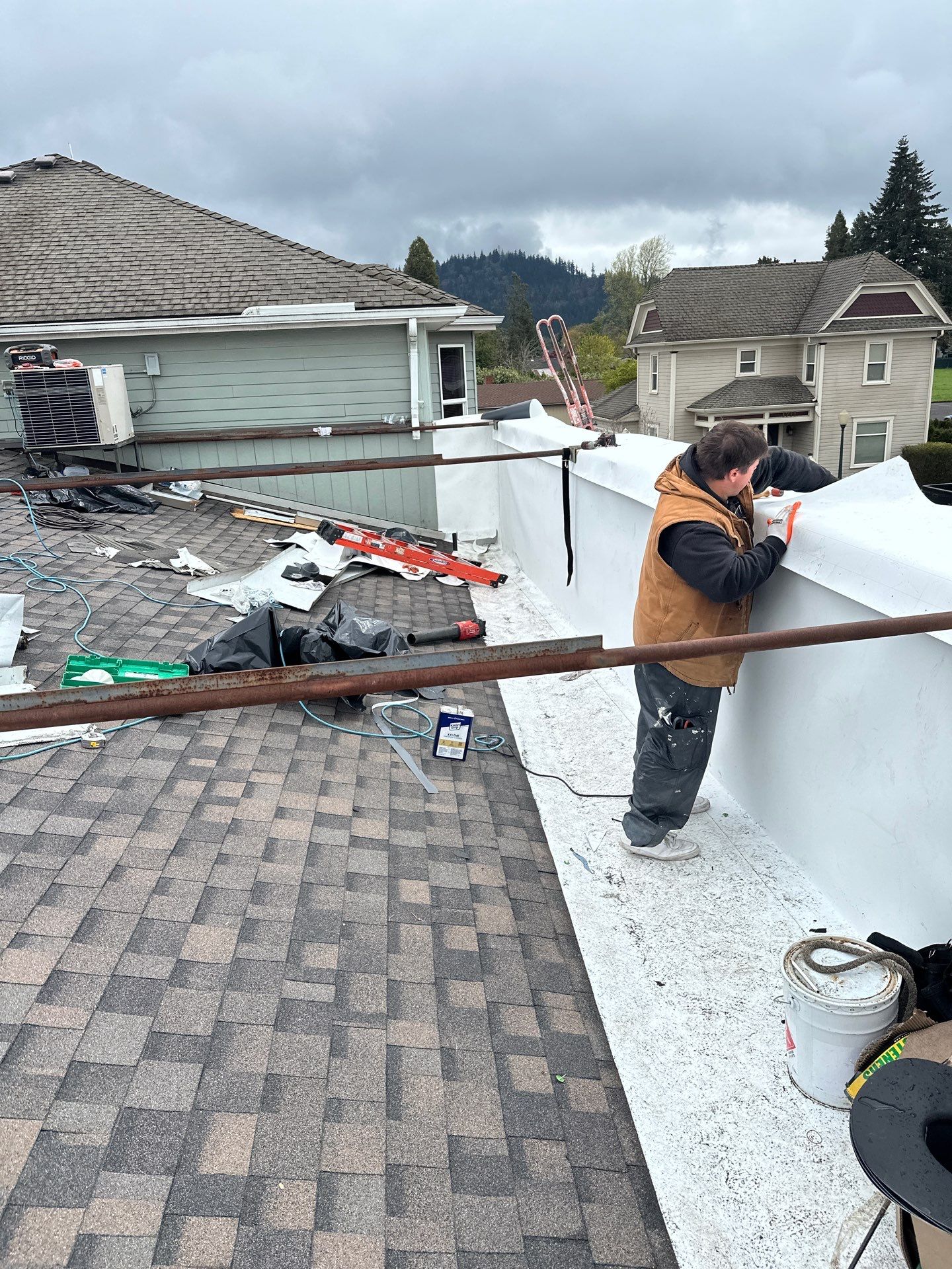 Commercial Roofing Installation using IKO Dynasty & GAF 60Mil TPO by Orezona Building & Roofing Company, Inc.