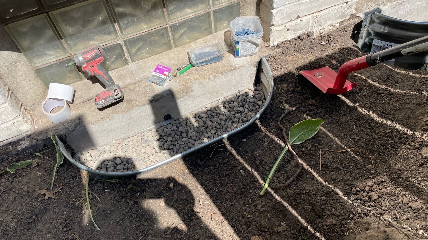 Drain Tile, Window Wells & Buried Discharge in Minneapolis by Waterproofing Northeast