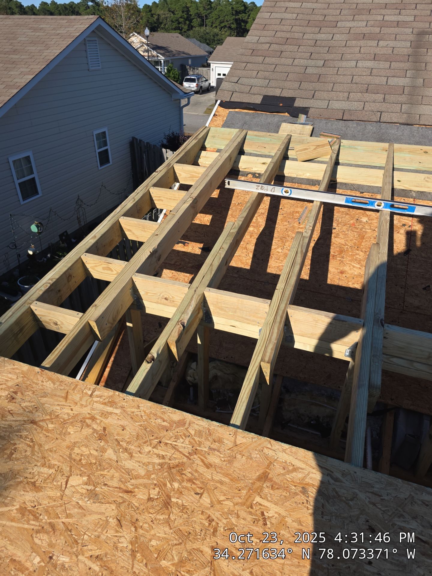 Covered Porch Build and Fortified Roof Replacement with Solar Panels by RGR Construction and Roofing, LLC