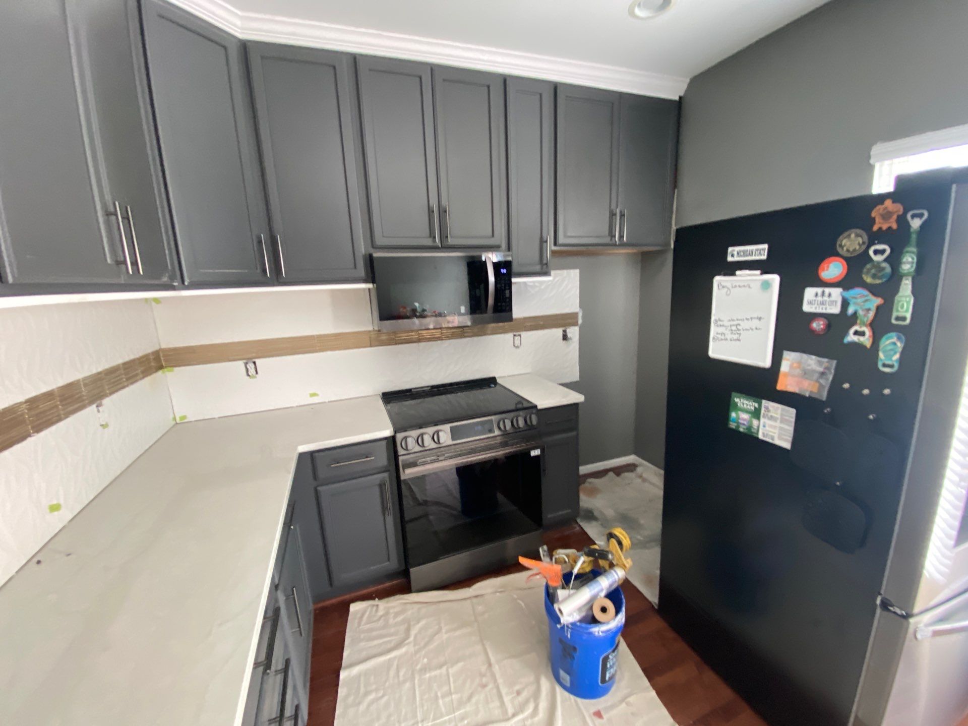 Modern Kitchen Cabinet Refinishing and Hardware Upgrade in Detroit by Top Shelf Painter