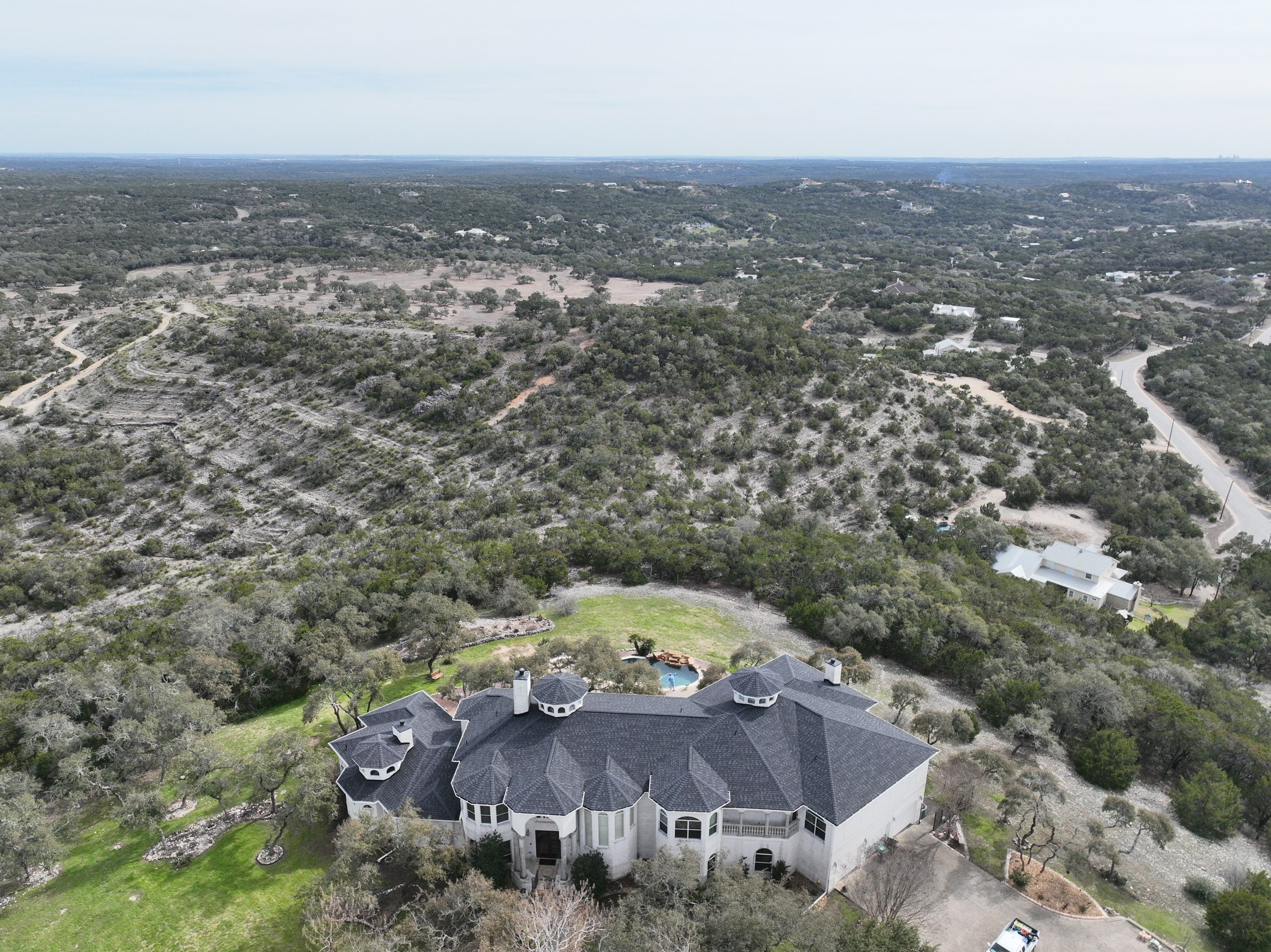 Residential Roof Replacement using 30 Year Laminate Shingles with High Profile Ridge by Premier Roofing and Contracting
