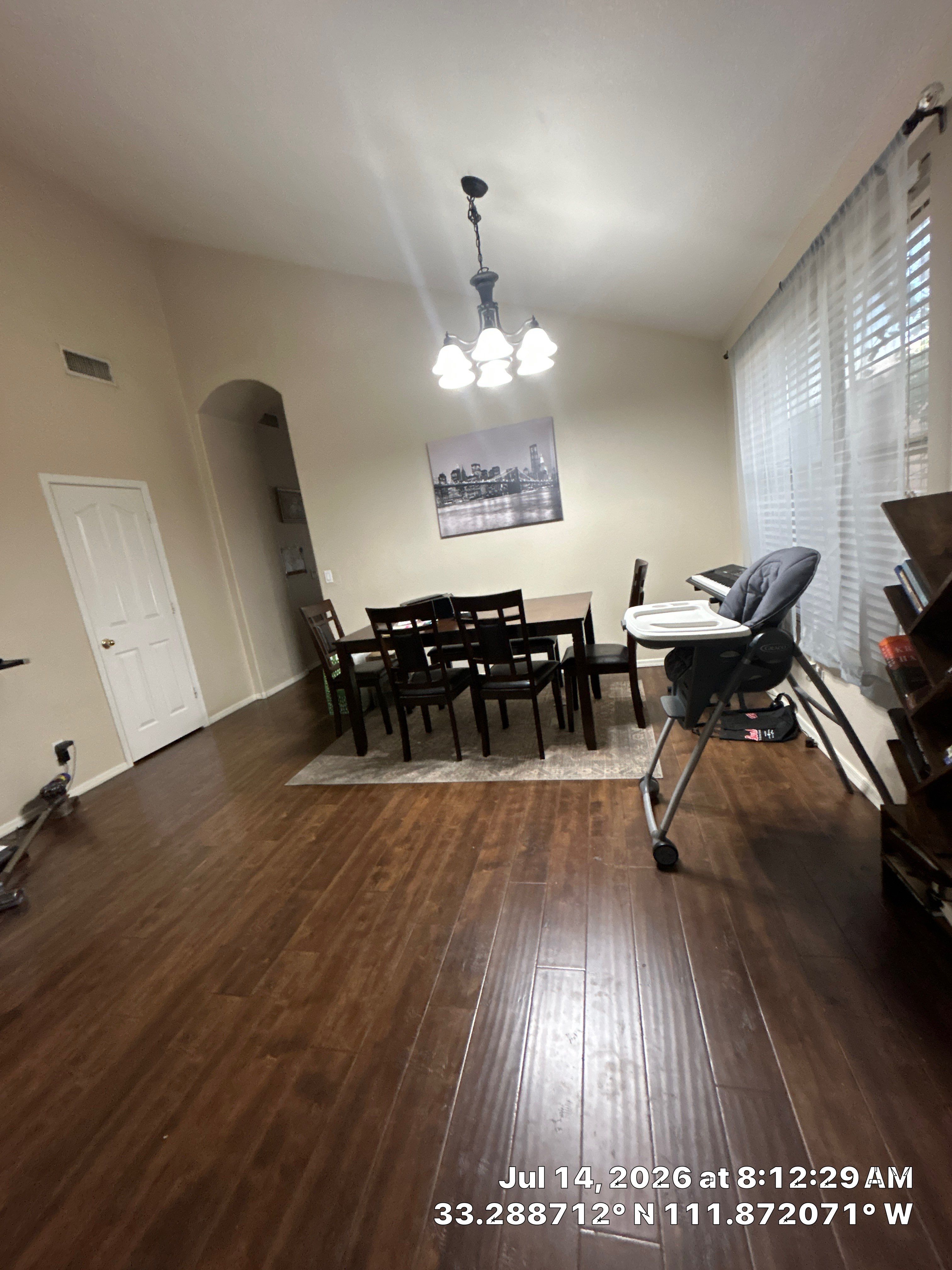 Modern Dining Room Renovation Featuring Wood Look Plank Flooring in Chandler by CompanyCam Sales Demo