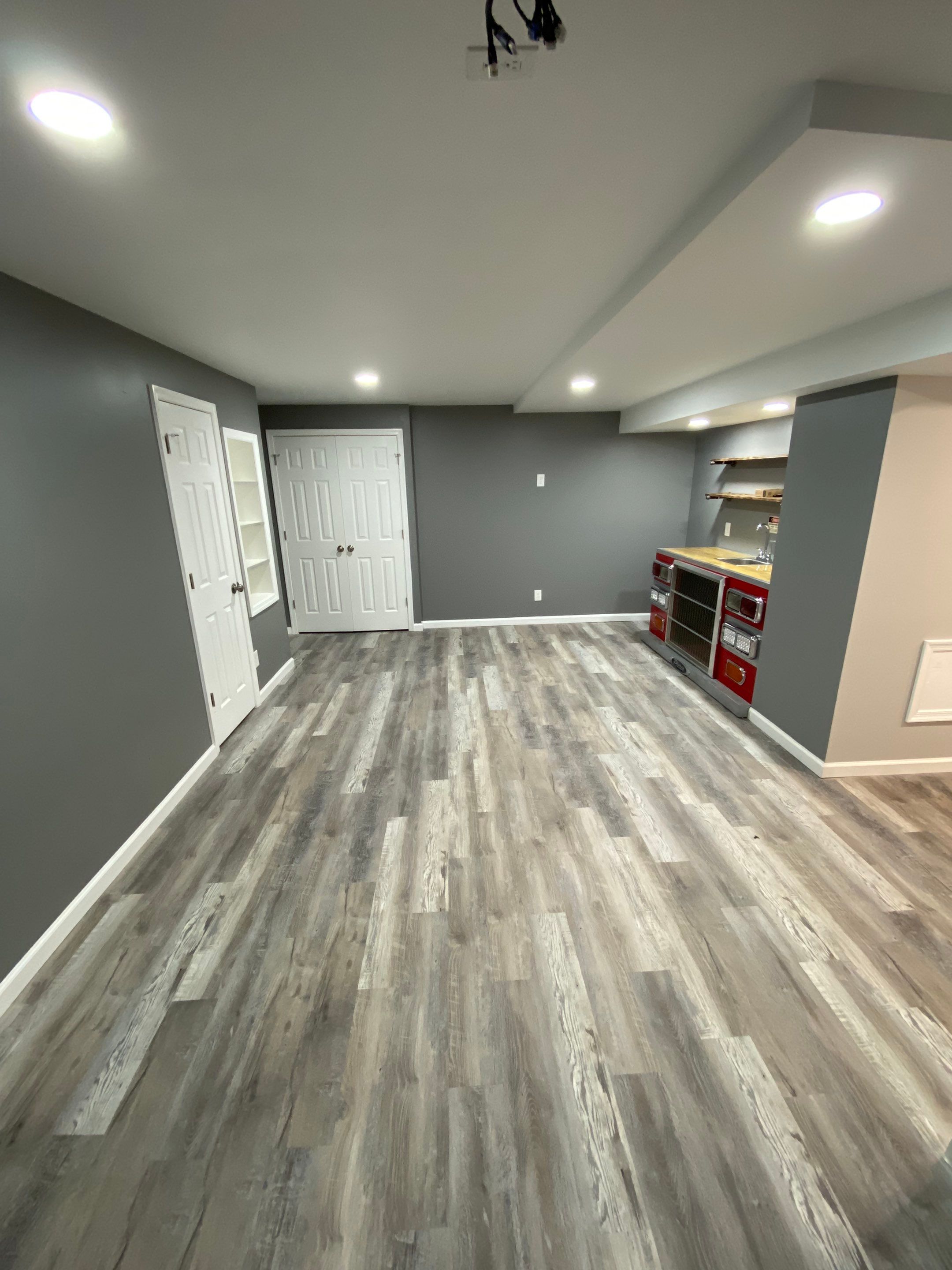 Complete Basement Buildout by The Smet Companies, LLC