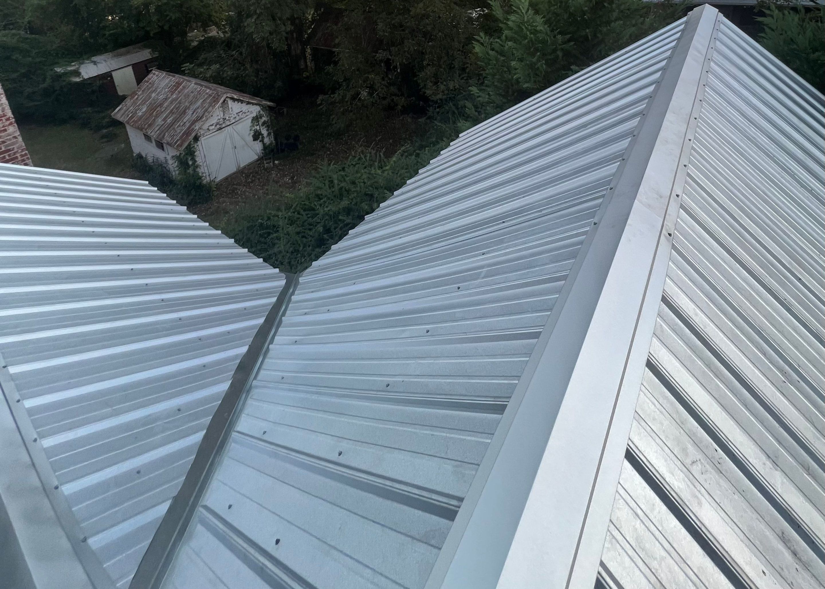Residential Roofing Installation using 26 Gauge Metal by The Roofing Dudes