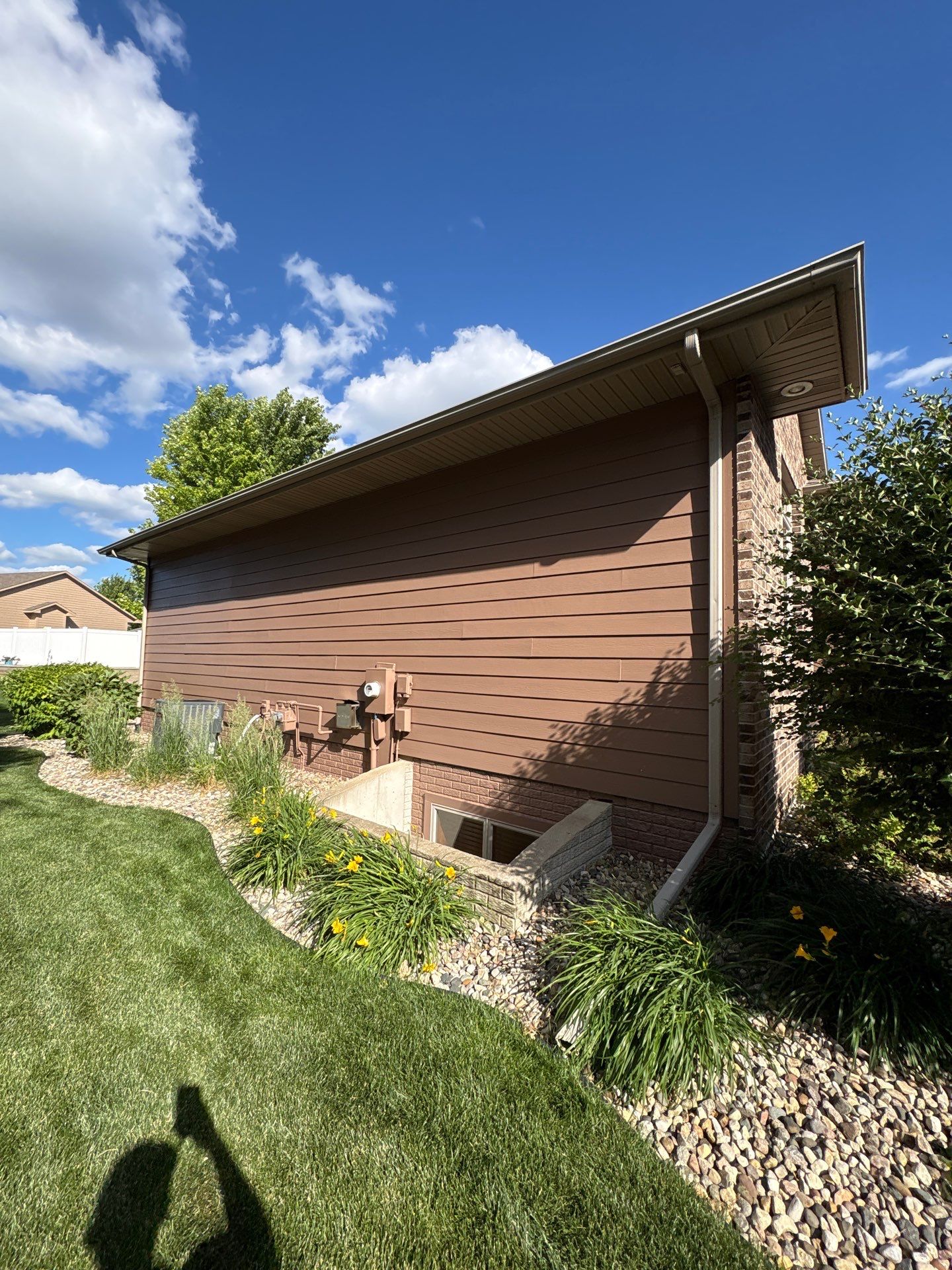 Exterior Painting and Wooden Deck Staining in Sioux Falls by Select Painting, Coatings & Garage Cabinets