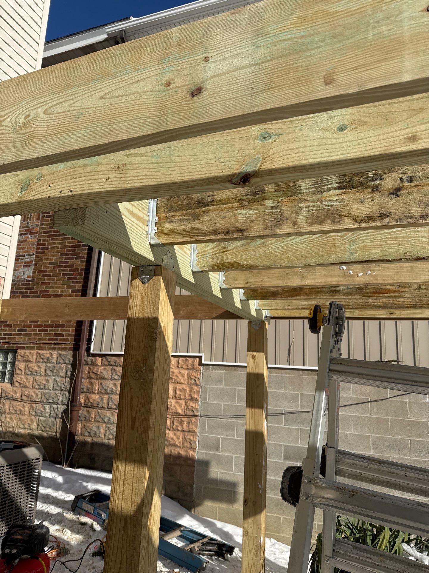 Deck and door by Cousins Roofing Siding & Decks