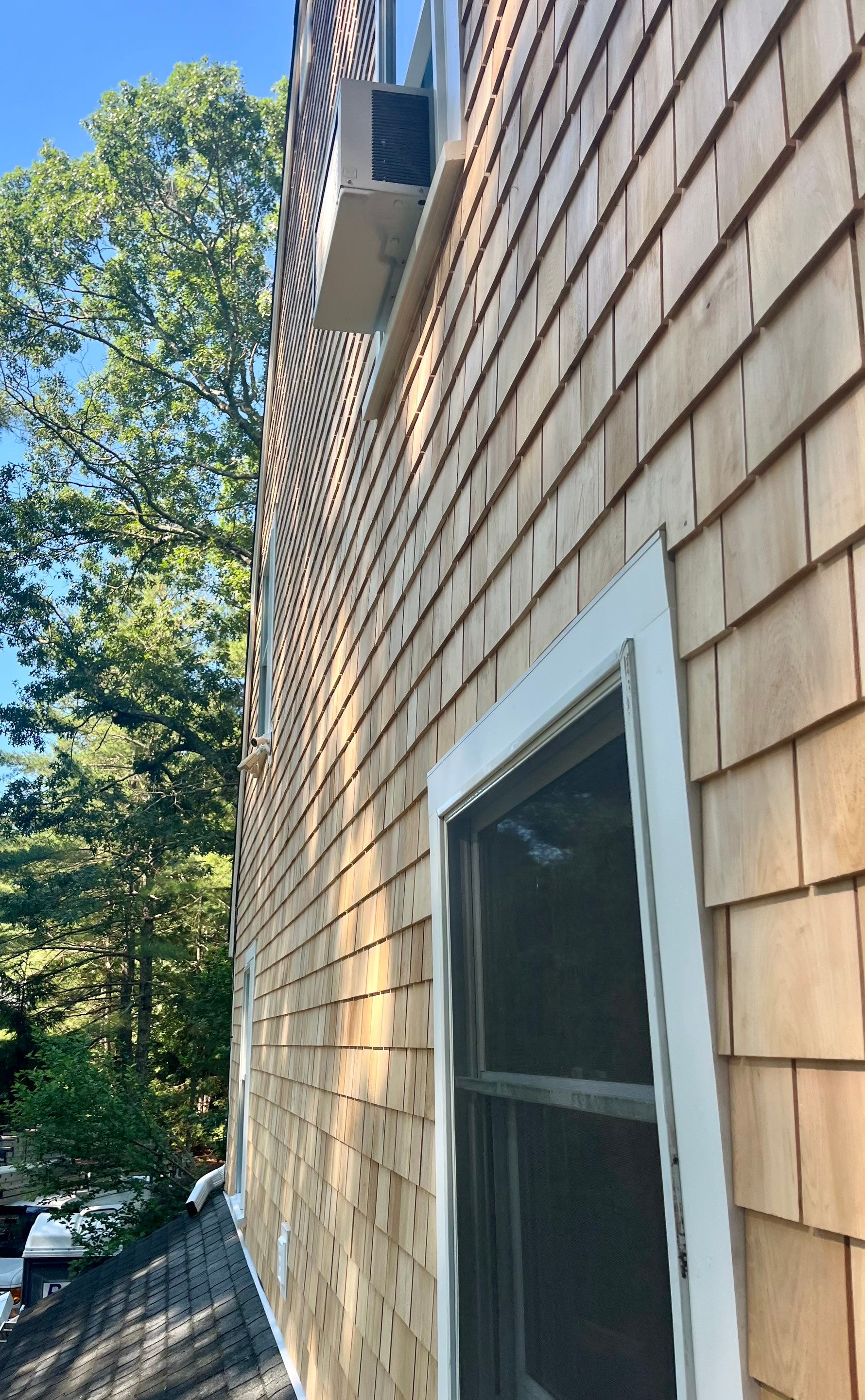 Partial residing project with Red Cedar shingles in Duxbury, MA by UBrothers Construction