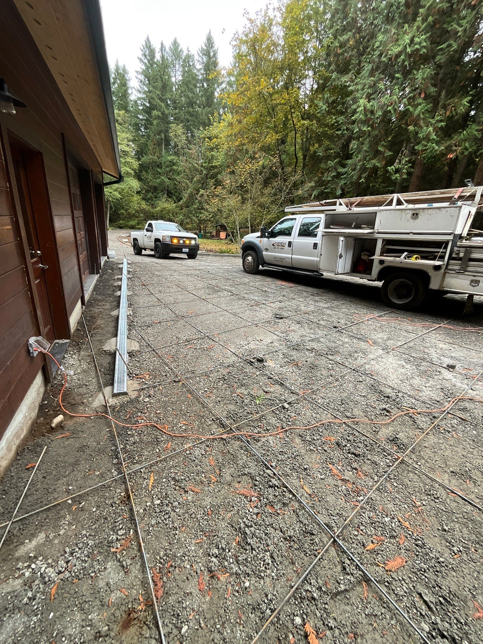 Pia | Custom Concrete Driveway, Walkway & Floating Steps by Jireh Asphalt & Concrete Inc 