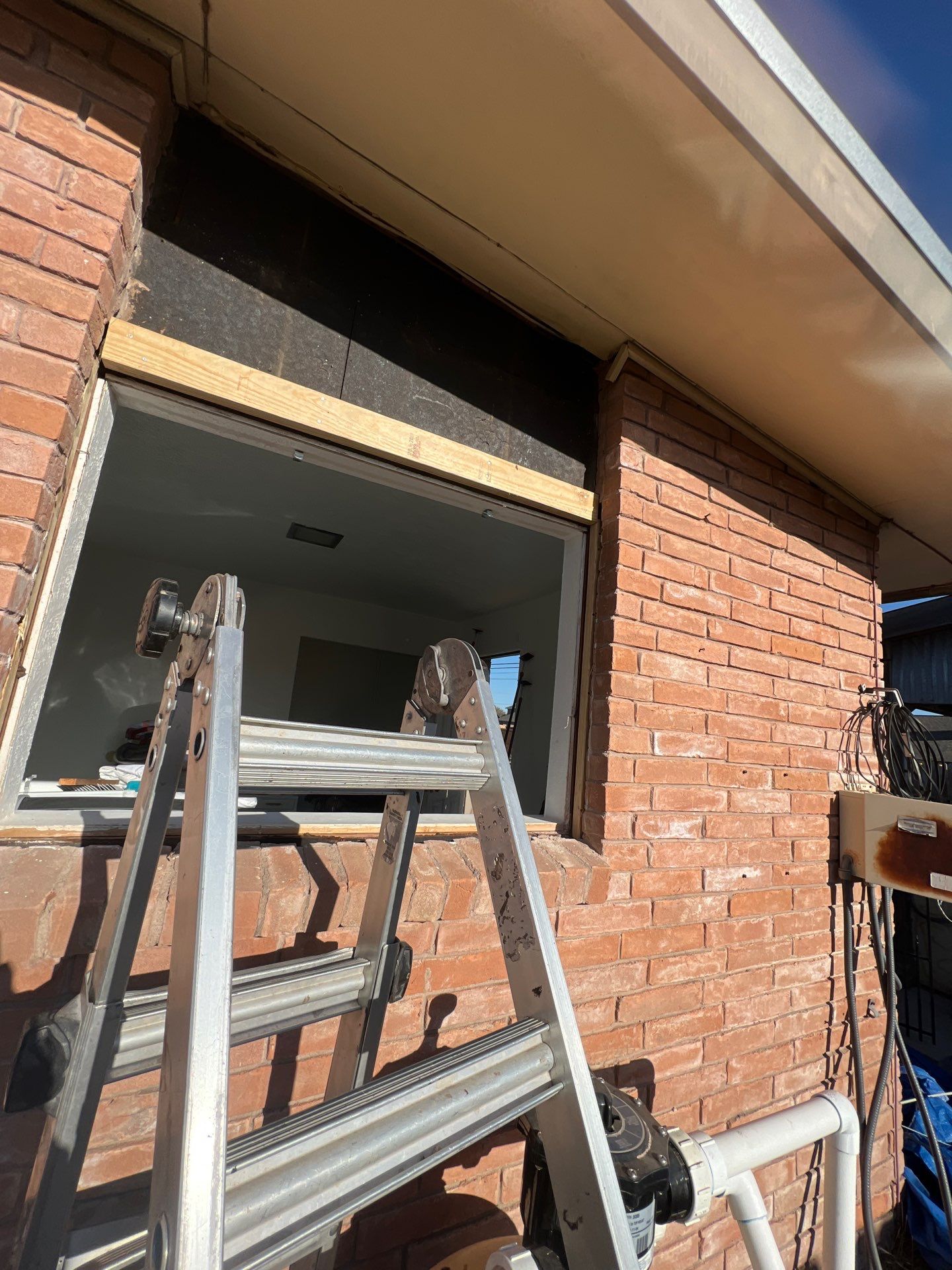 Windows in Brick with a Bay Window by Bayfront Roofing and Construction