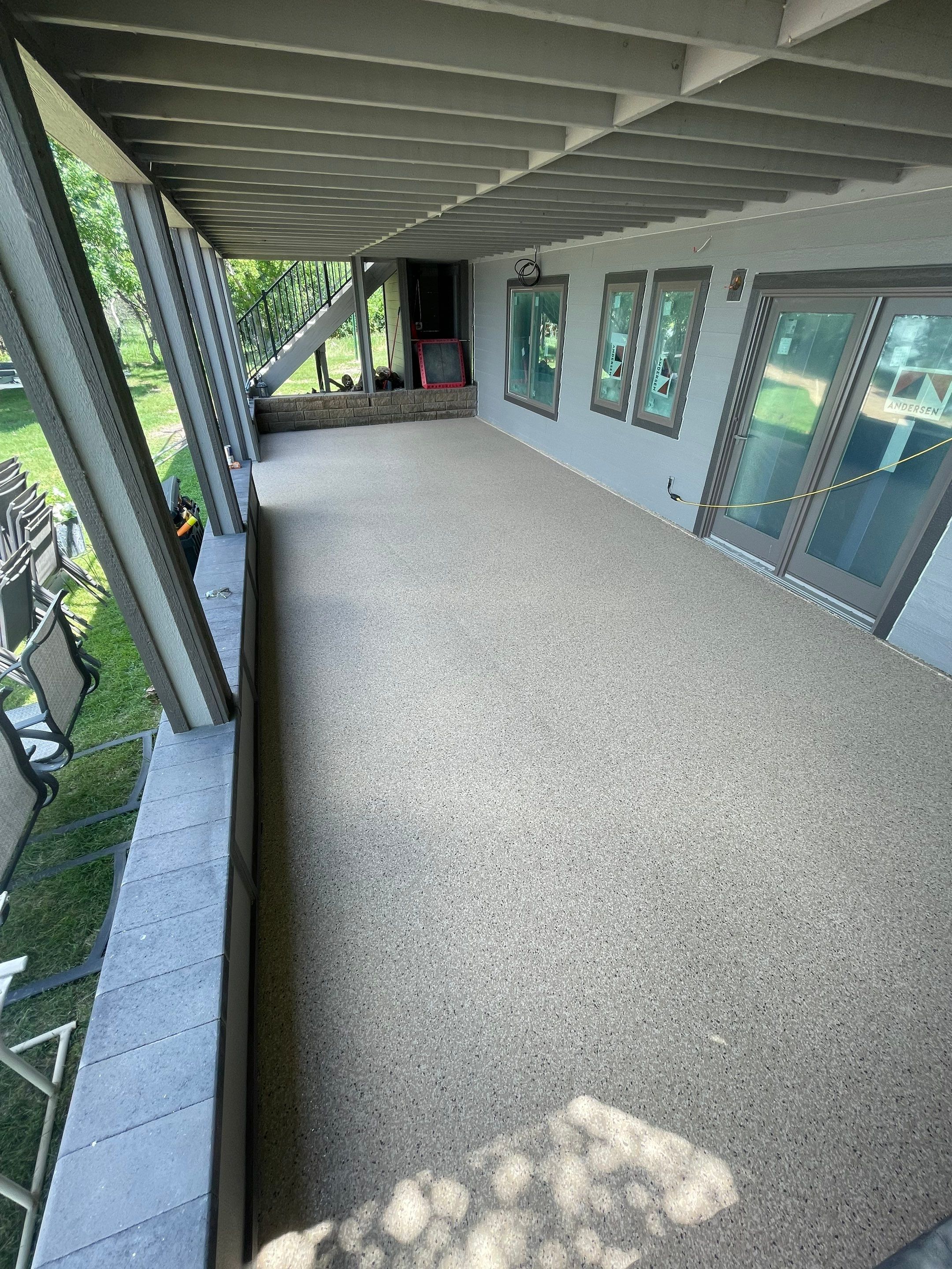 Lakefront Screened Patio Concrete Coating Installation in Wentworth by Select Painting, Coatings & Garage Cabinets