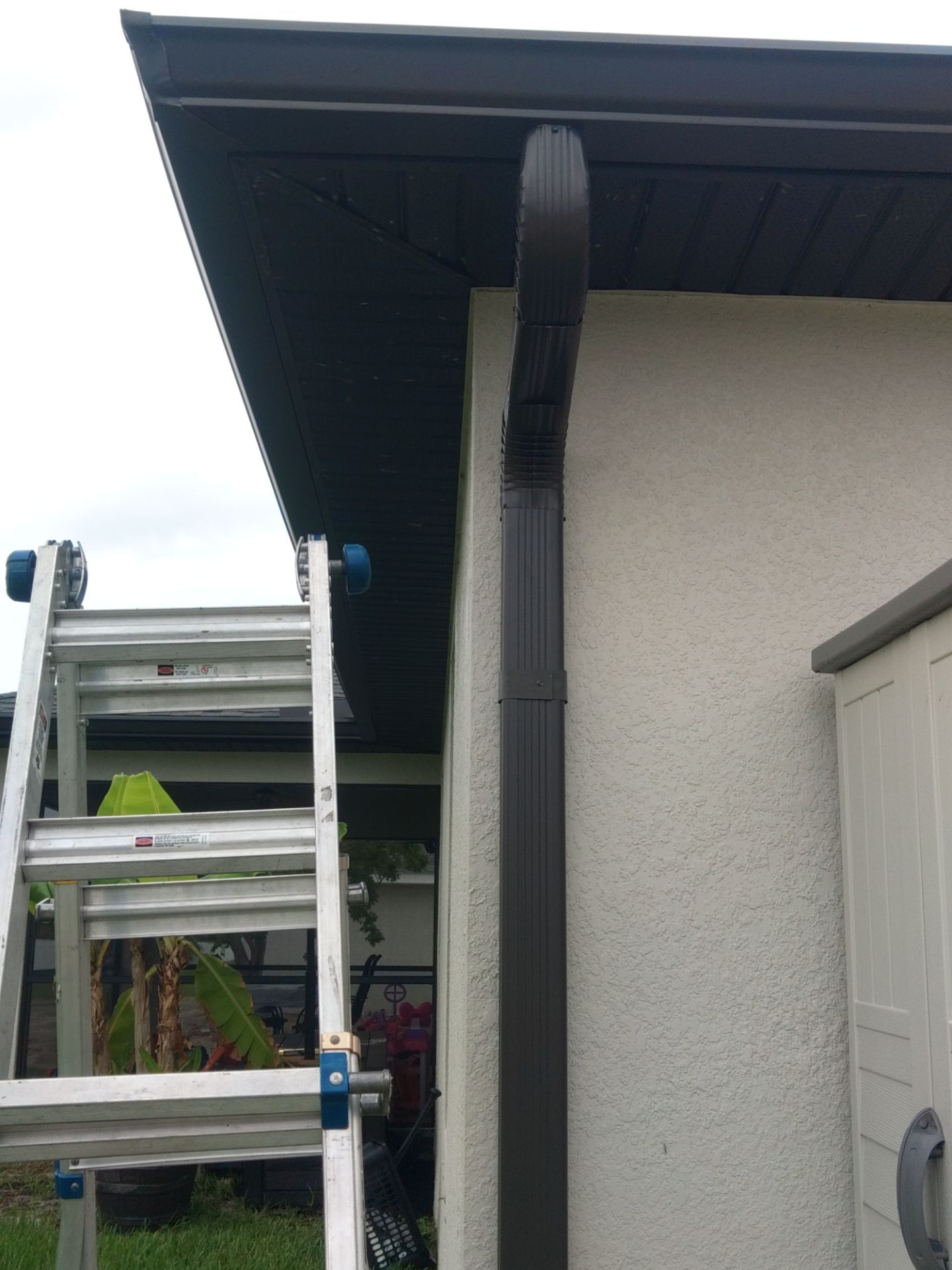 Black Seamless Gutters using black seamless gutters in Cape Coral FL by Gutter Professors