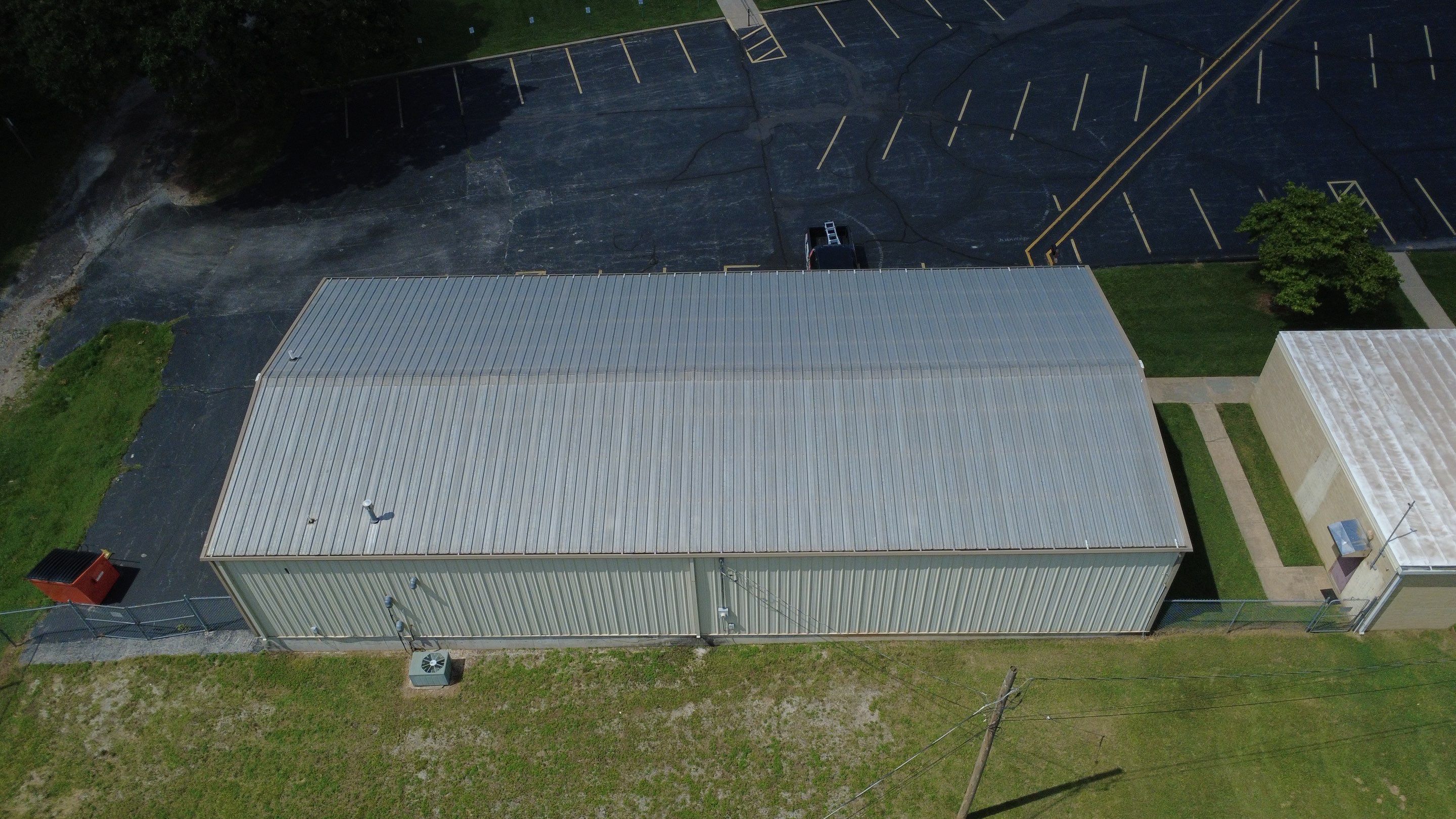 Commercial Roofing Install - Metal Coatings Restoration System  - Color White  by Titan Commercial & Residential Roofing 