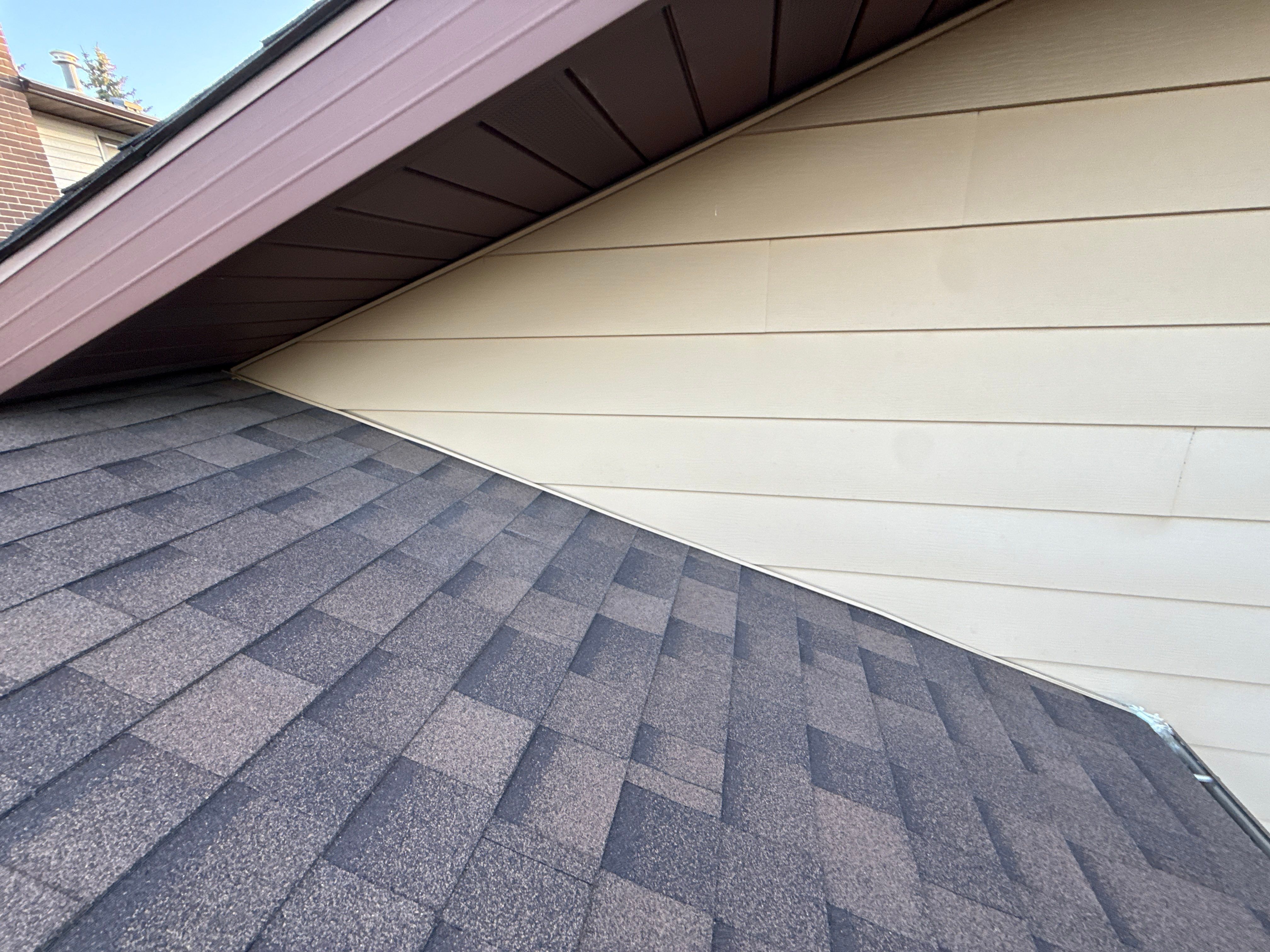 Calgary Chimney Chase Reconstruction and Exterior Siding Replacement by Smart Home Building Systems Ltd.